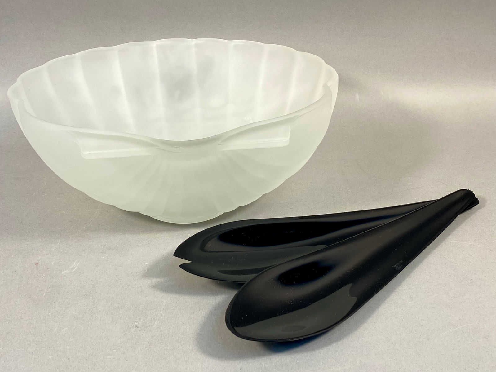 Tiara Exclusive Frosted Satin Glass Shell Form Salad Set with Original Box: This three-piece vintage salad set, distributed by Tiara Exclusive, features a large serving bowl crafted from frosted white satin glass. The bowl is designed in a stylized shell form with a scalloped