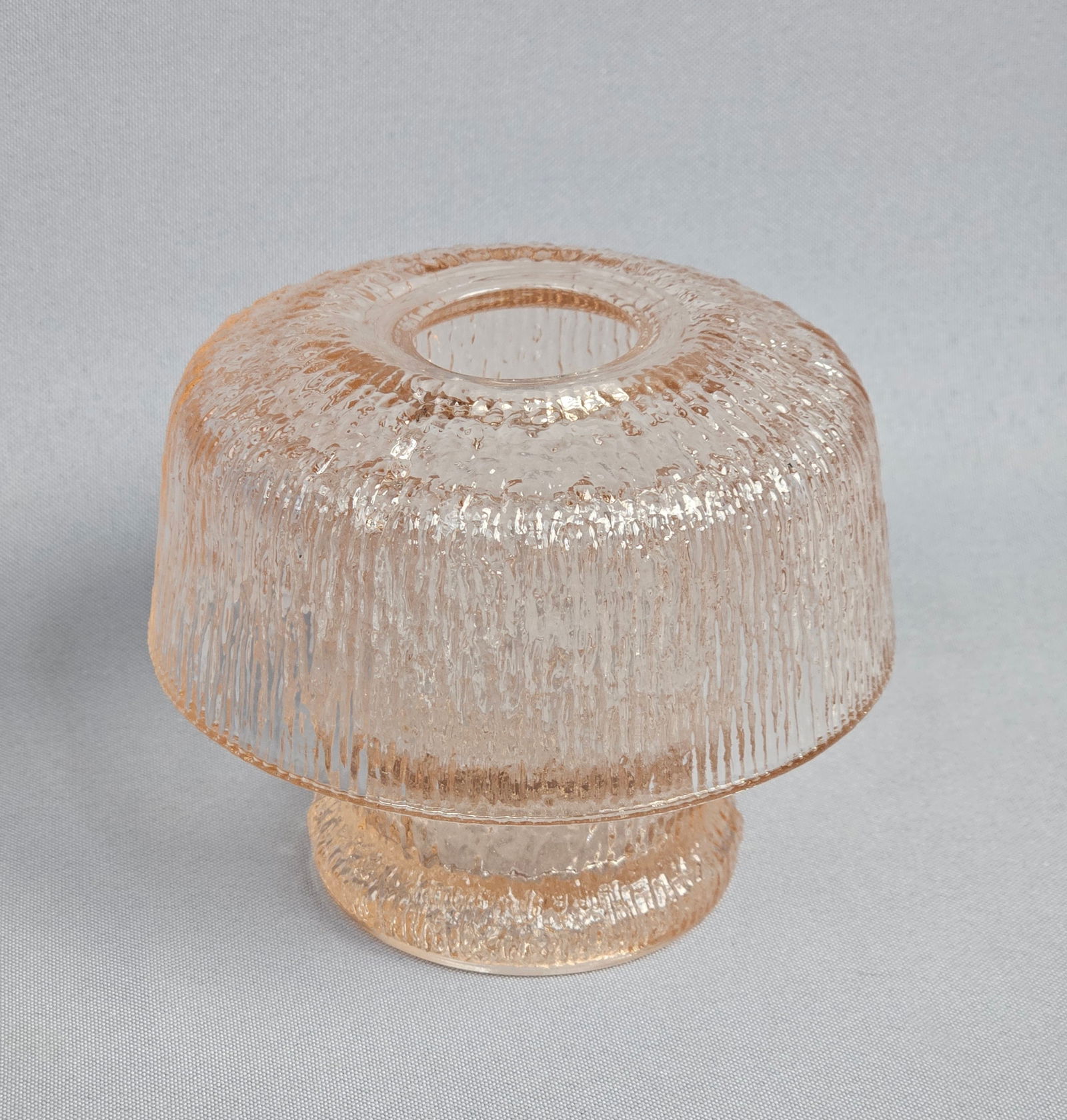 Tiara Exclusives Pink Ice Pattern Textured Glass Fairy Lamp: This two-piece pressed glass fairy lamp is designed in the Pink Ice pattern, which was distributed by Tiara Exclusives. The item is composed of a dome-shaped shade with a circular top vent and a match