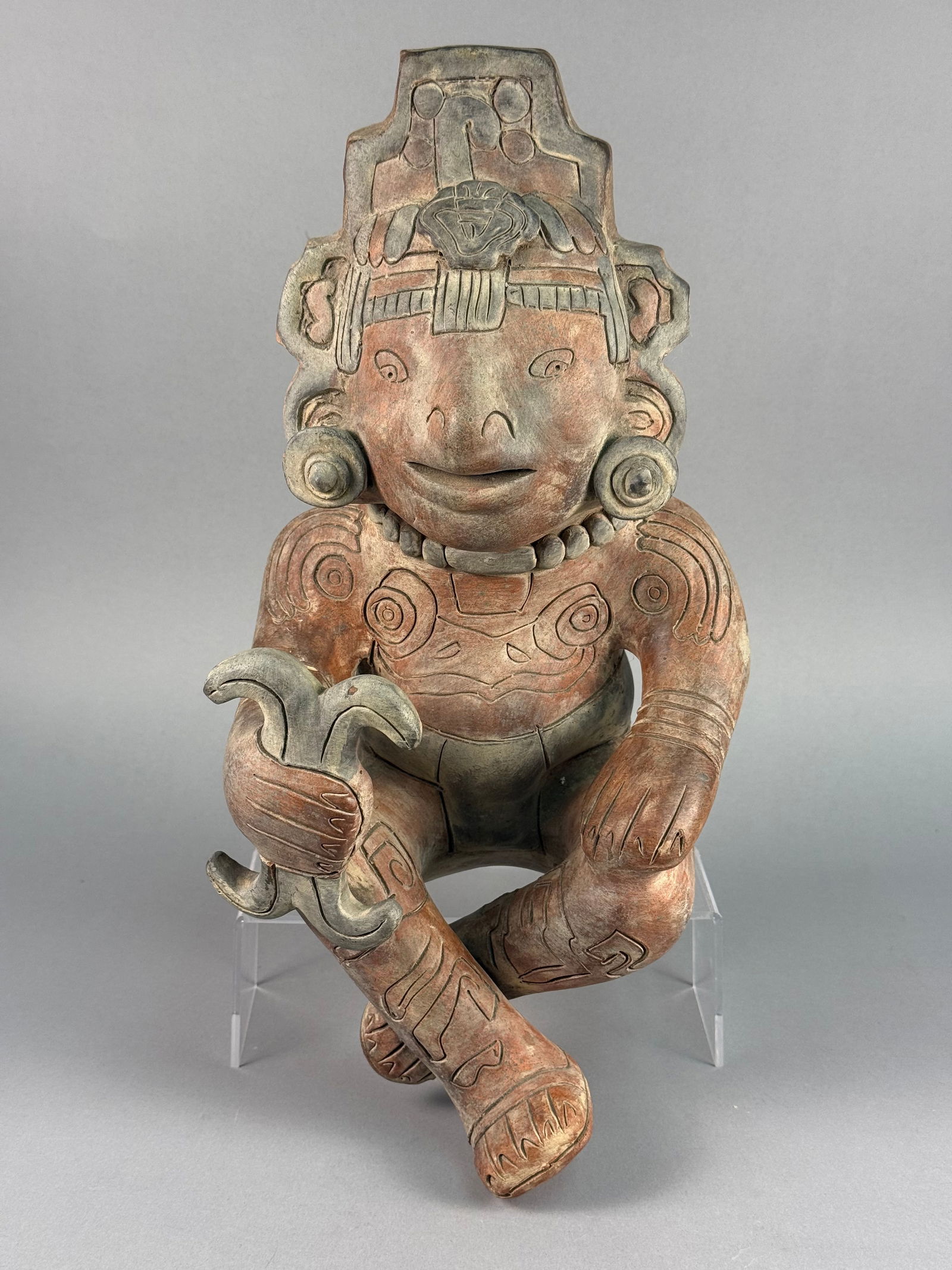 Pre-Columbian Style Large Ceramic Anthropomorphic Ballplayer Figure: This large-scale ceramic anthropomorphic figure is rendered in a Pre-Columbian style, characteristic of Mesoamerican traditions such as those from West Mexico or the Gulf Coast. The object is construc