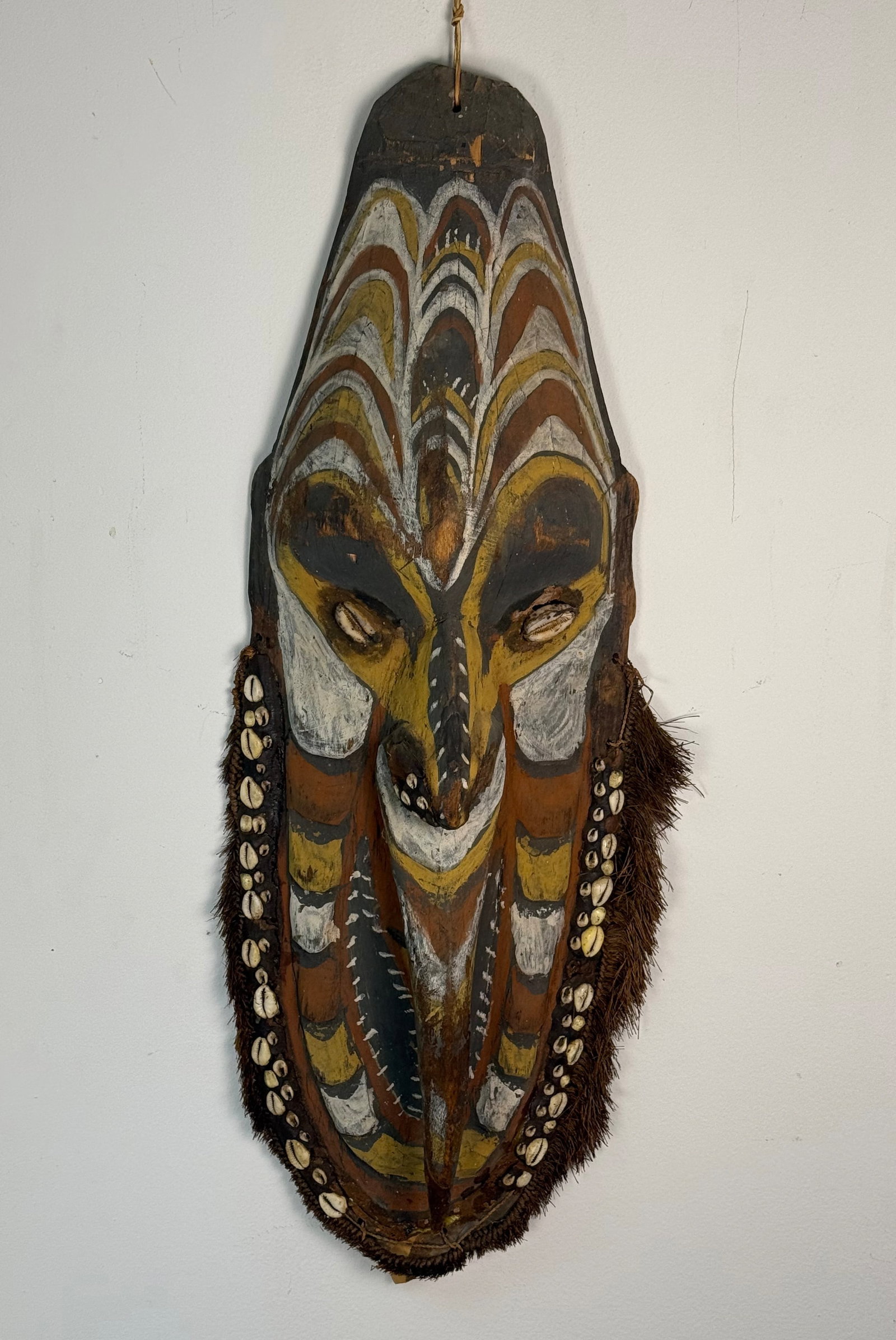 Papua New Guinea Sepik River Polychrome Carved Wood Spirit Mask with Cowrie Shells and Fiber Fringe (1 of 11)