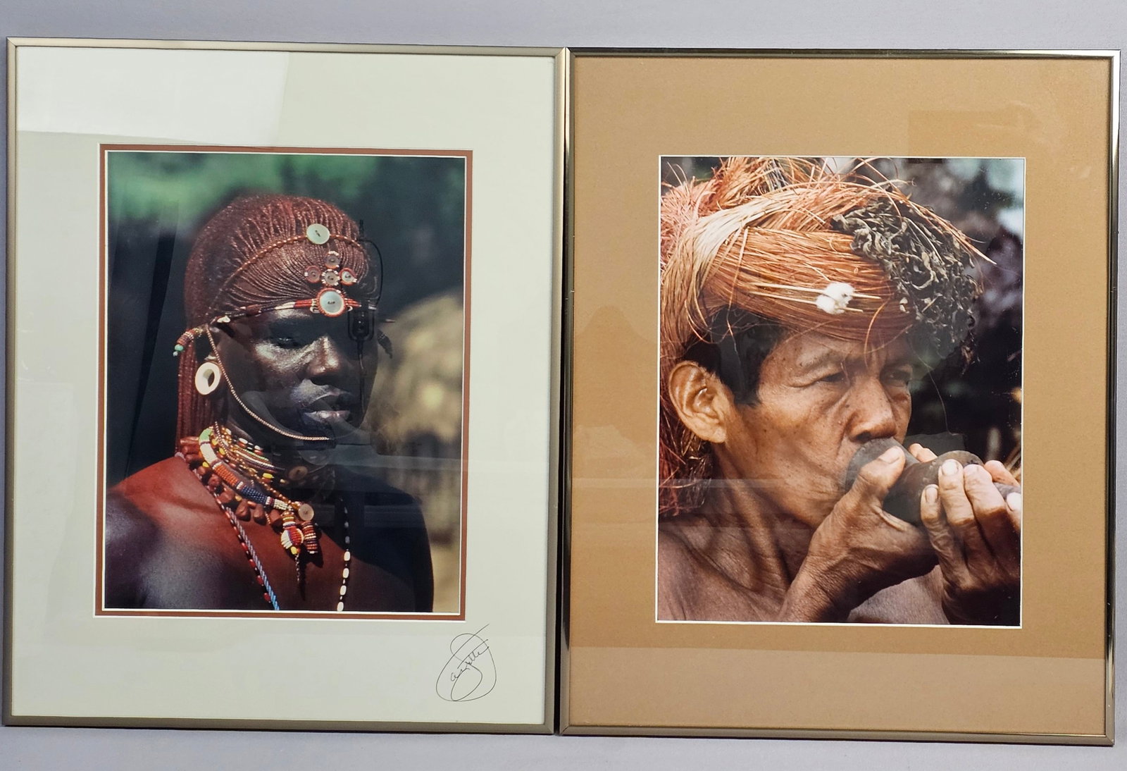 James E. Ayotte Pair of Chromogenic Color Photograph Prints Samburu Dancer and Deadly Aim: James E. Ayotte (American, 20th Century). A pair of chromogenic color prints (C-prints) featuring ethnographic portraits. The first work, titled Samburu Dancer, depicts a young man from Kenya, Africa,