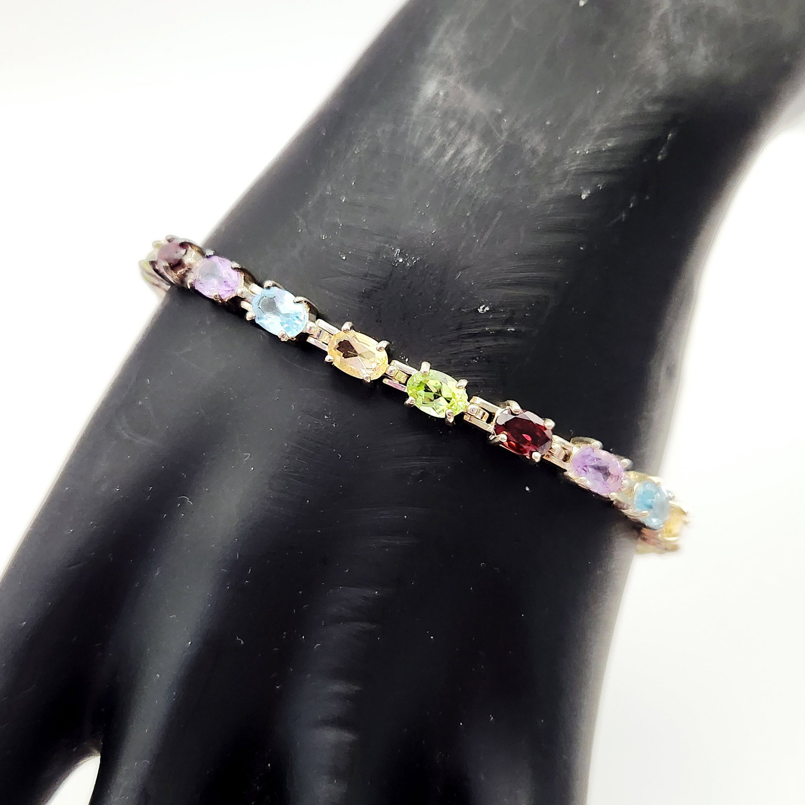 A Sterling Silver and Multi-Gemstone Link Bracelet (1 of 8)