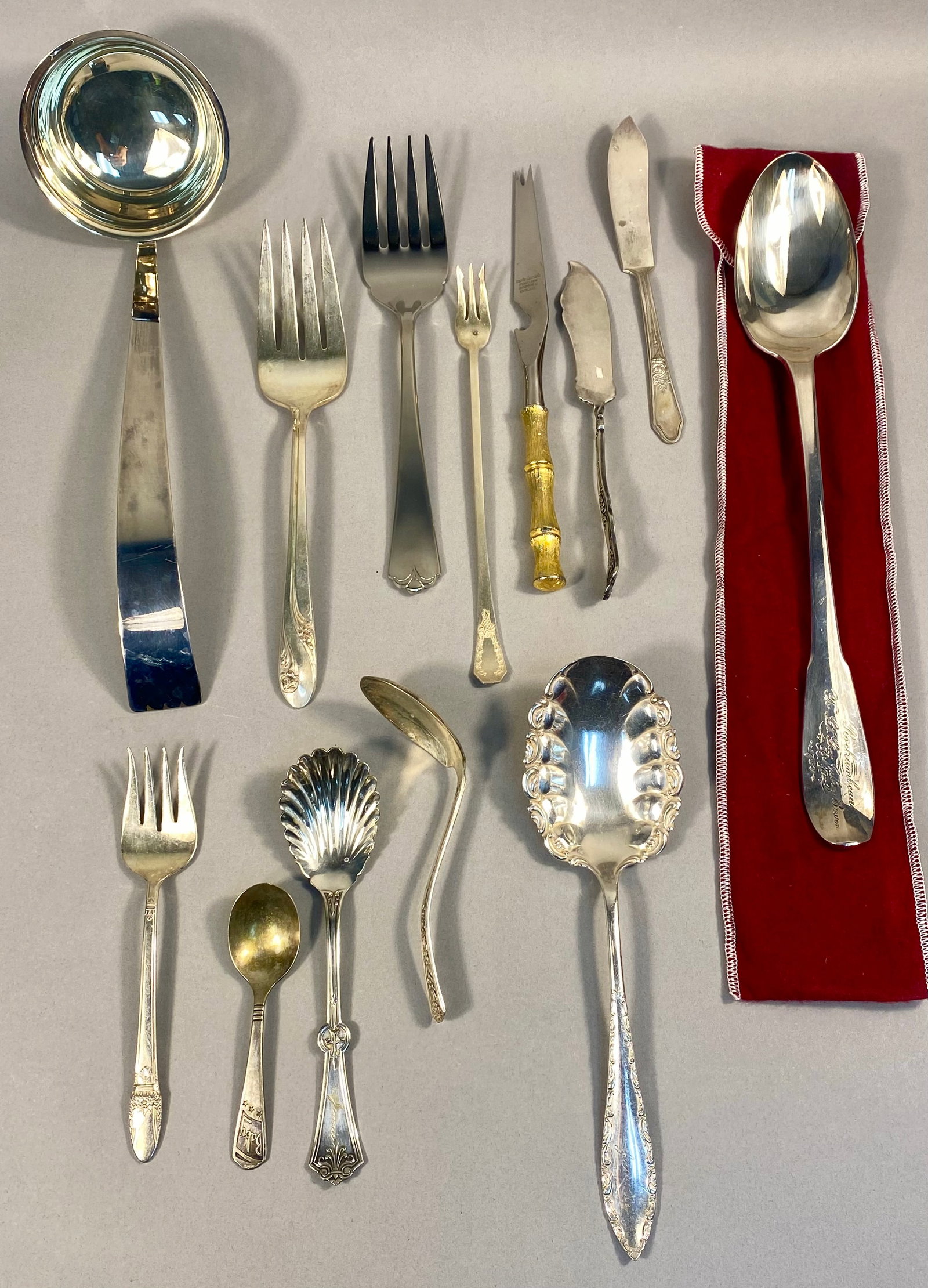 An Assortment of Silver-Plated and Stainless Steel Flatware and Serving Pieces (1 of 15)