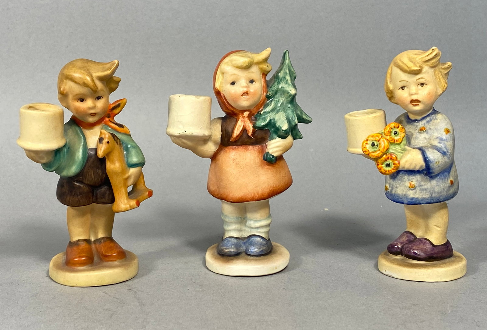 A Trio of Vintage German Mel Ceramic Figurine Candle Holders in the Hummel Style (1 of 4)
