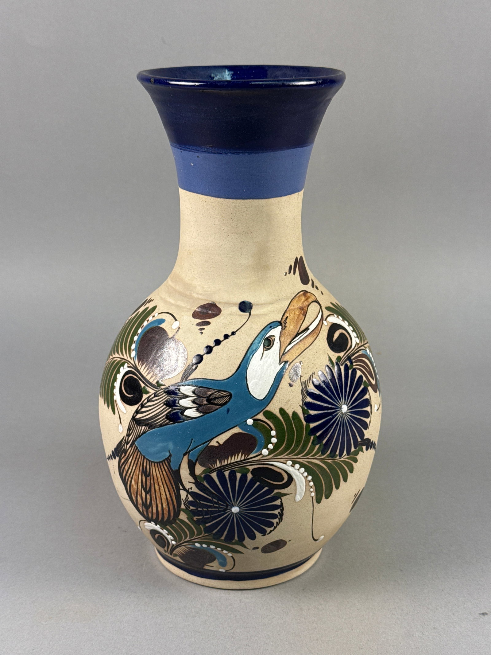 Tonala Mexican Folk Art Burnished Ceramic Vase Signed Mateos: This hand-painted ceramic vase is the work of the Mateos family, prominent artisans from the Tonala region of Jalisco, Mexico. The vessel is constructed of burnished earthenware featuring a matte, buf