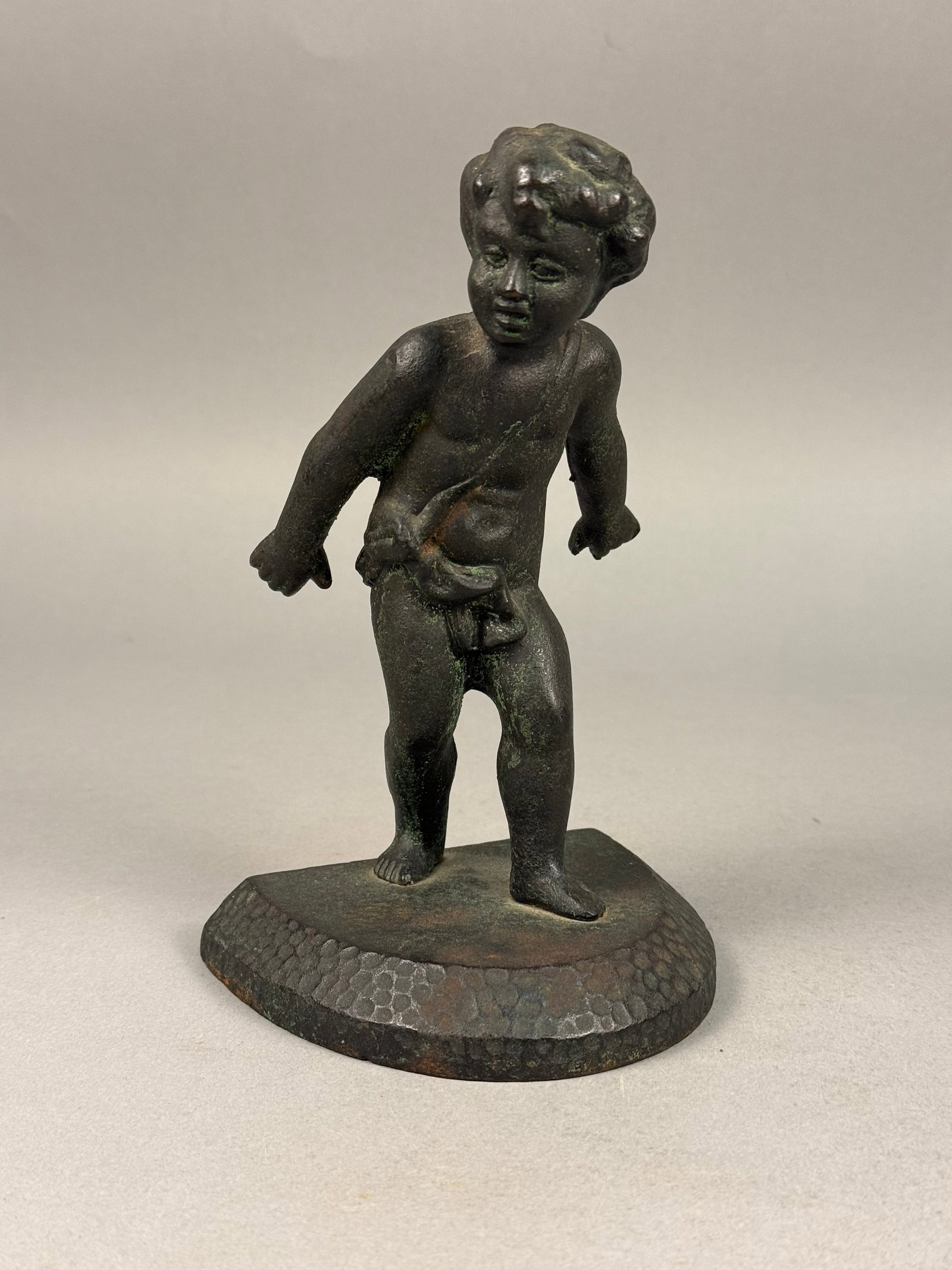 Patinated Metal Figure of a Standing Youth Door Stop (1 of 7)