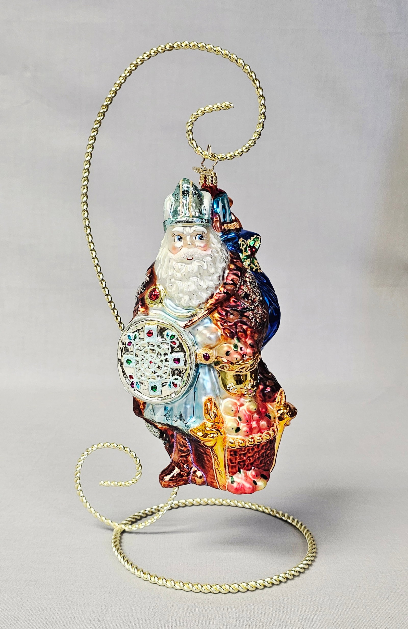 Christopher Radko Viking Claus Santa Glass Ornament: Stand not included. A large Christopher Radko hand-blown glass Christmas ornament titled Viking Claus from the Santa Through the Centuries collection. The ornament is in very good condition with no vi