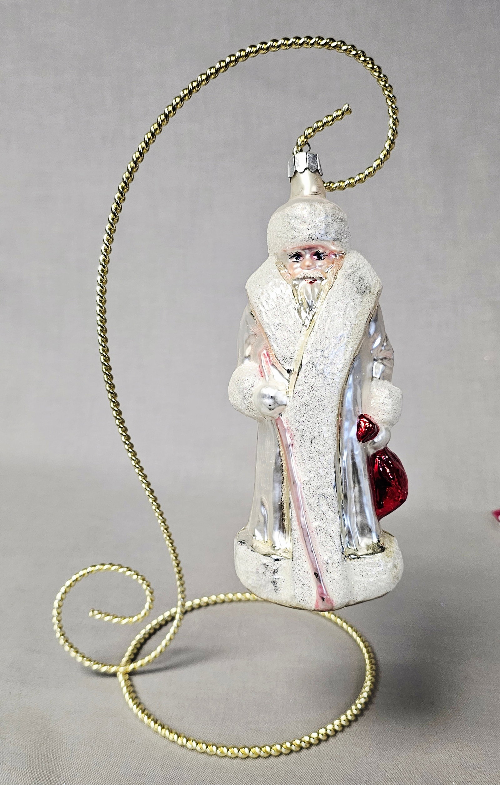 Christopher Radko Winter Splendor Russian Santa Ornament: Stand not included. A mouth-blown and hand-painted silvered glass Christmas ornament by Christopher Radko, depicting a Russian-style Santa Claus or Grandfather Frost. This ornament is in very good con