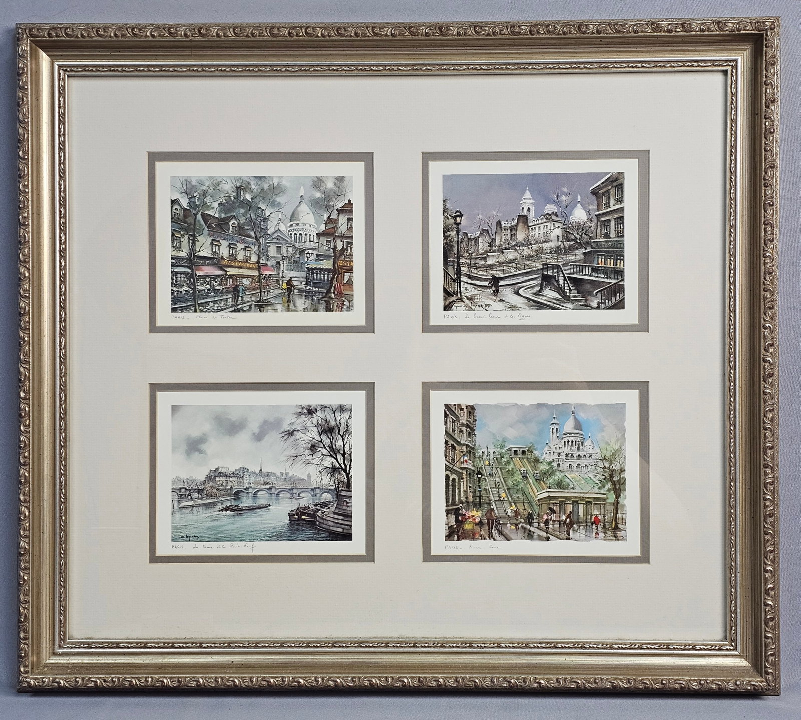 Framed Maurice Legendre Parisian Street Scene Prints: Maurice Legendre (French, 20th Century). A collection of four color art prints, likely offset lithographs, after original watercolor compositions. The scenes depict iconic landmarks and neighborhoods