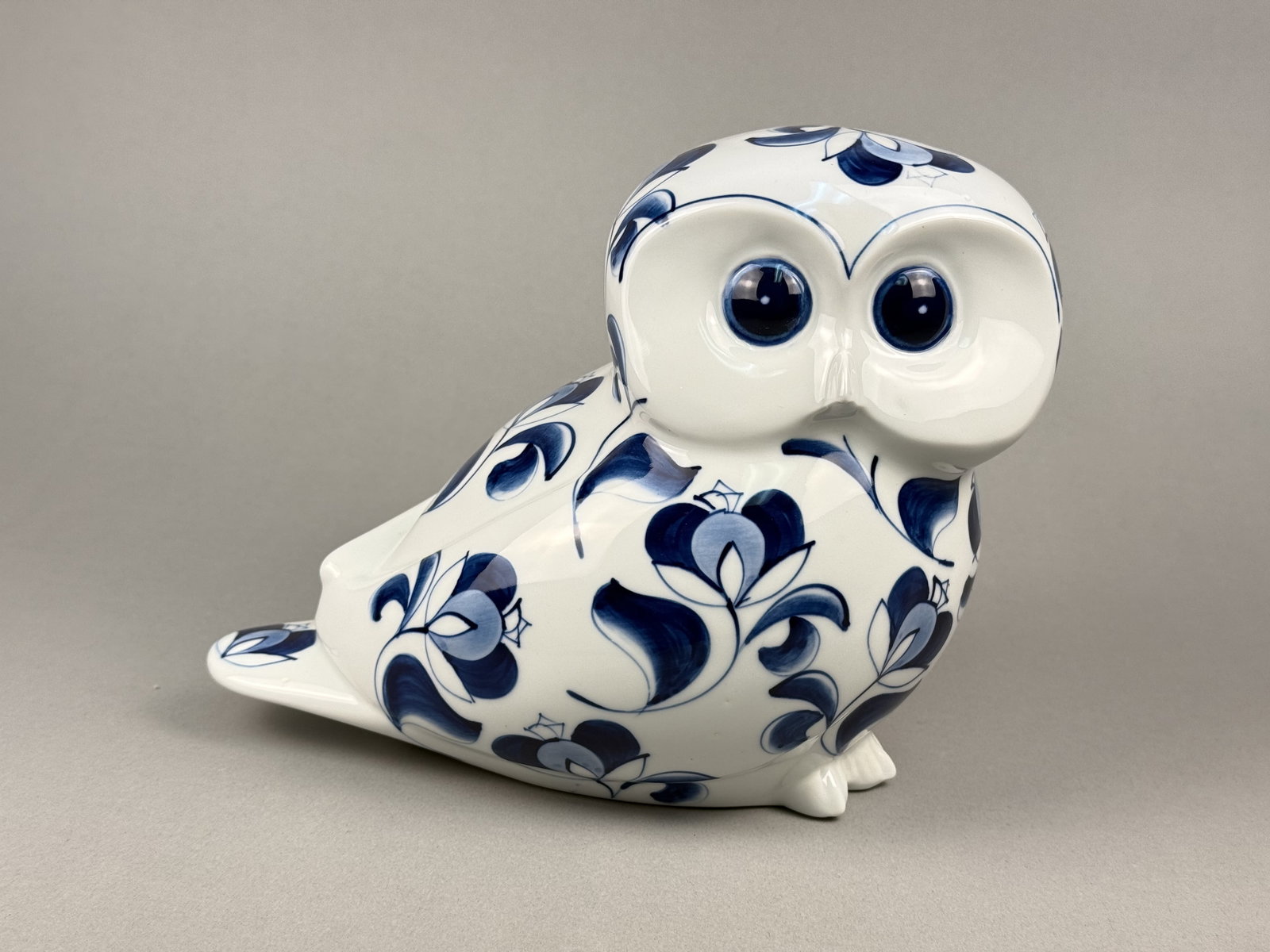 Cardinal Fine Porcelain Philippines Owl Figurine: This porcelain figurine depicts a stylized owl, produced by Cardinal Fine Porcelain in the Philippines and marketed under the Treasure Chest Connoisseur Collectibles brand. The face features