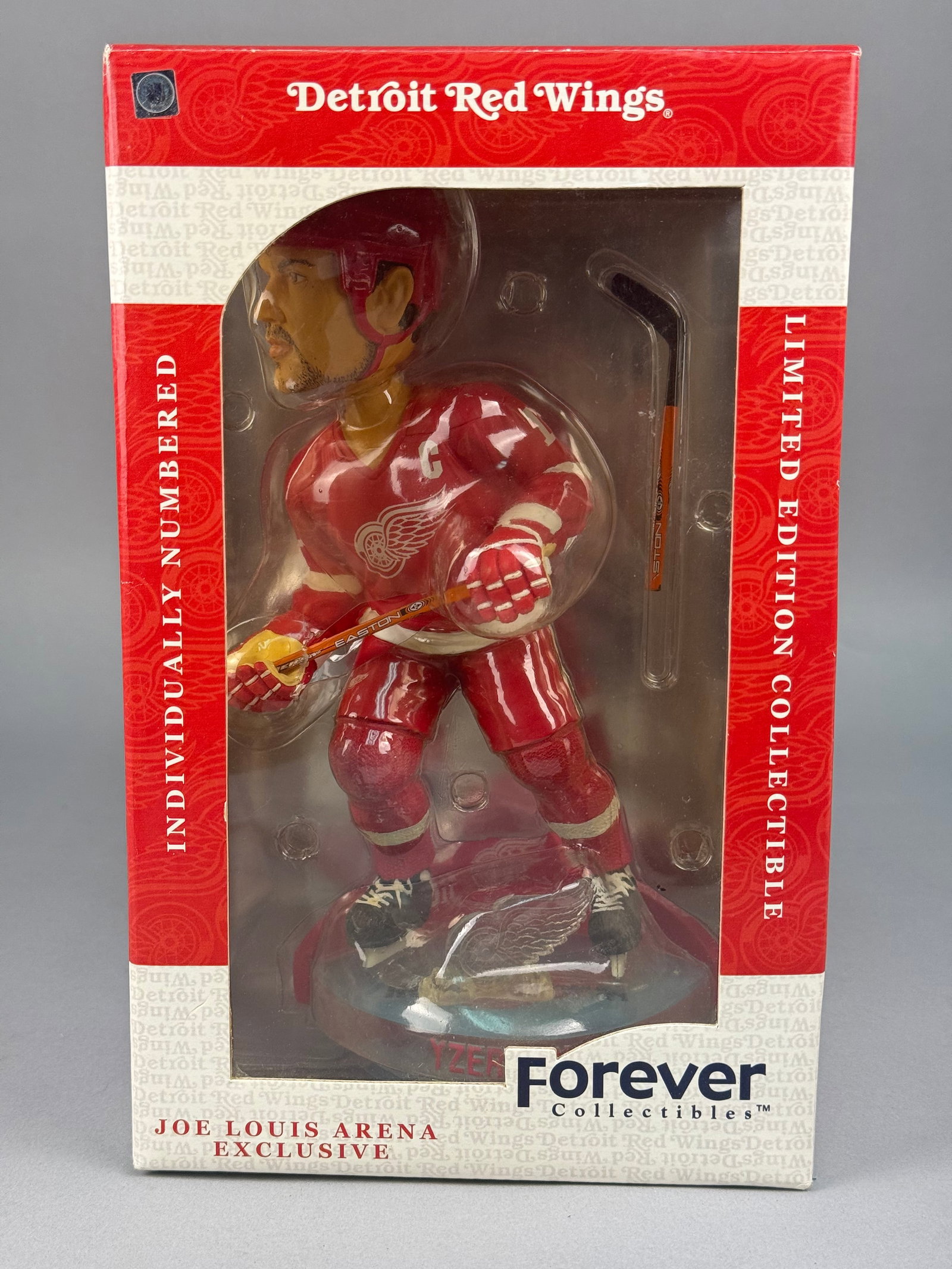 Steve Yzerman Detroit Red Wings Joe Louis Arena Exclusive Figurine: This Forever Collectibles figurine is a Joe Louis Arena exclusive and is presented in its original limited edition, individually numbered packaging. The cardboard box features official team branding