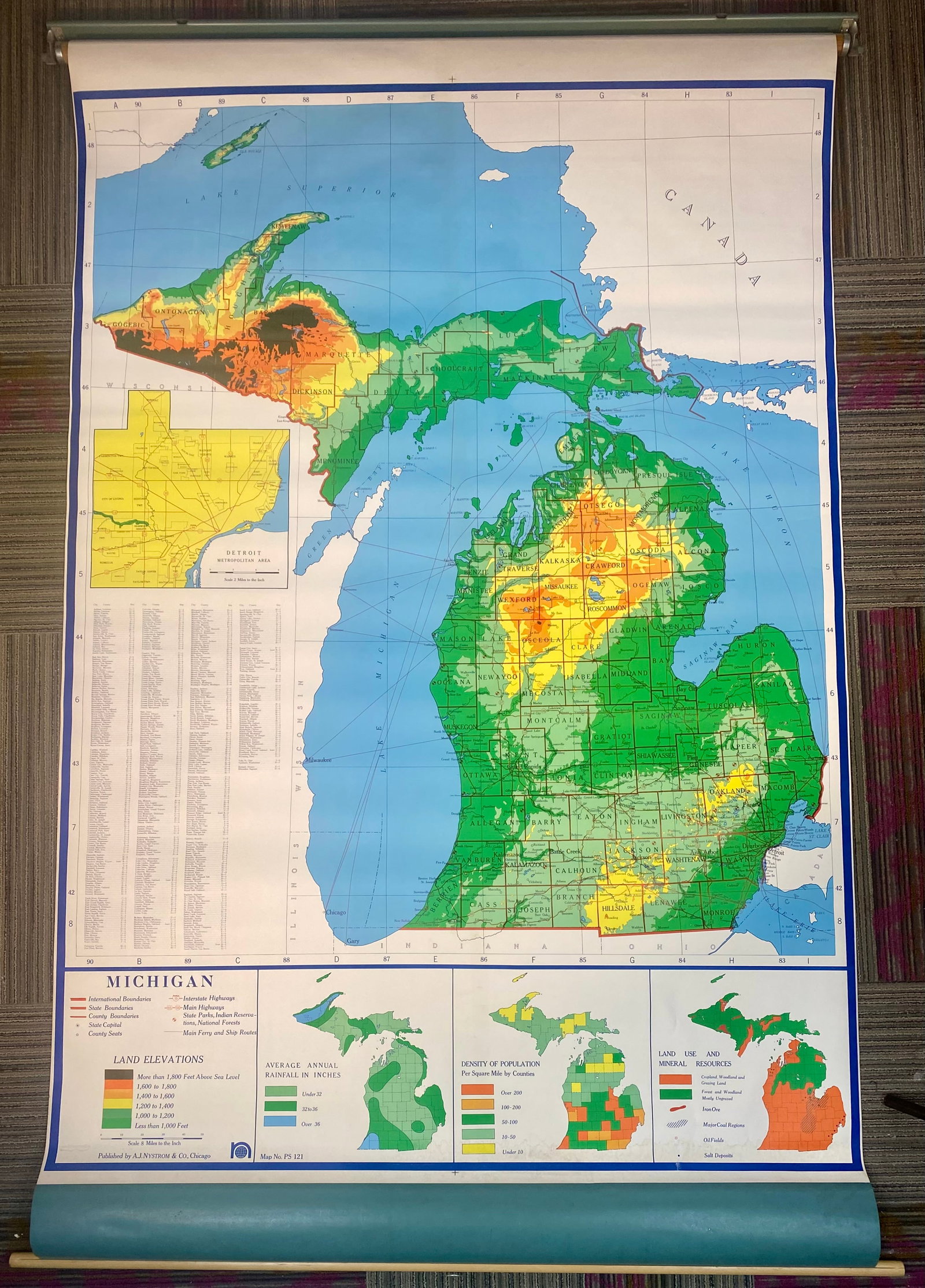A.J. Nystrom & Co. Michigan Physical Classroom Pull-Down Wall Map: This is a vintage classroom-style pull-down wall map of Michigan, identified as Map No. PS 121, published by A.J. Nystrom and Co. of Chicago. The map provides a detailed physical relief view of the