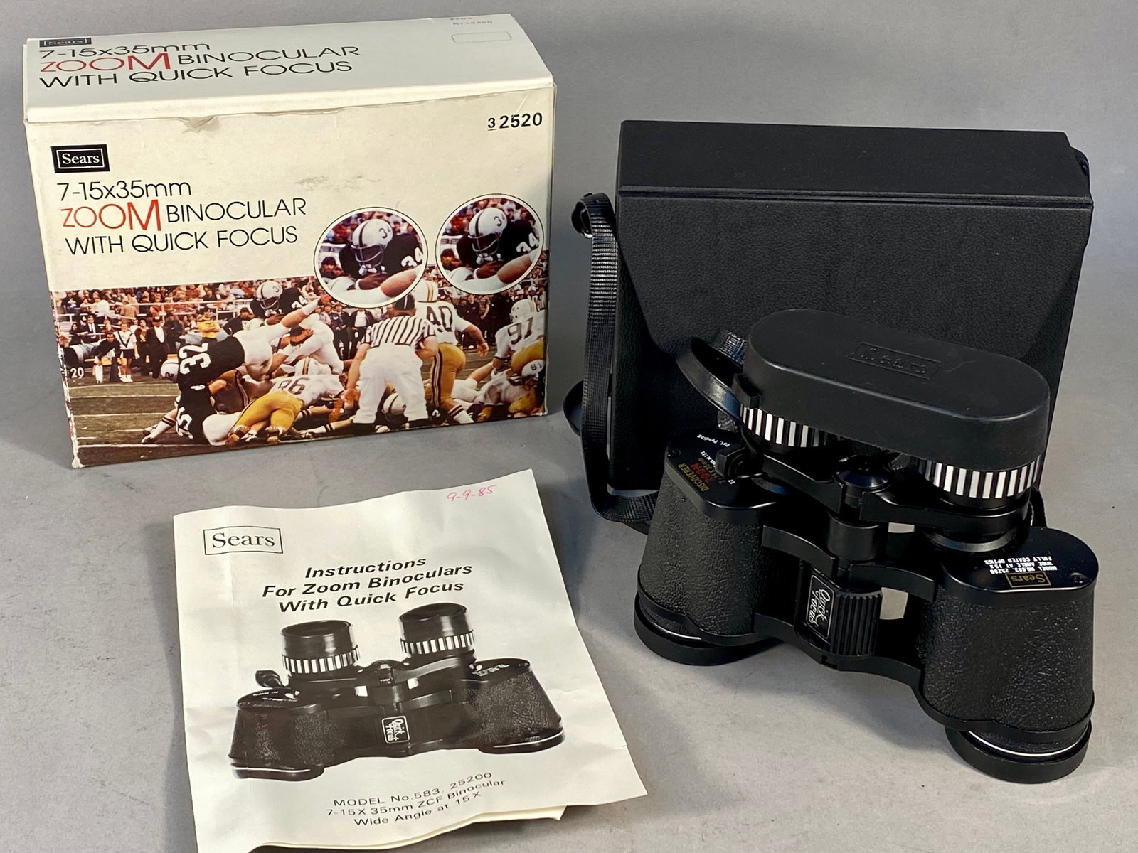 Vintage Sears Discoverer Model 583.25200 Zoom Binoculars with Quick Focus, 7-15x35mm: A pair of Sears Model No. 583.25200 zoom binoculars manufactured in Japan. The instrument is constructed with a black metal body featuring a pebbled-texture finish and rubberized objective lens rims