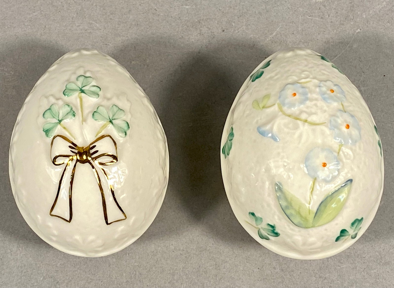 A Pair of Belleek Porcelain Lidded Egg Trinket Boxes (1 of 4)