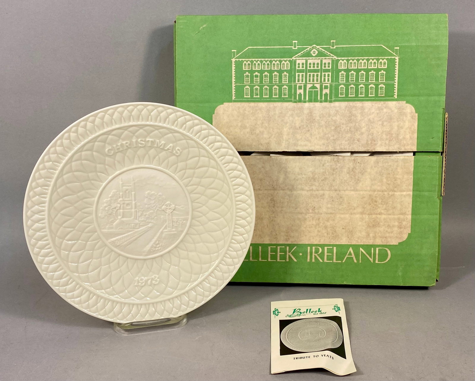 Belleek 1973 Limited Edition Christmas Plate Tribute to Yeats: This circular parian china collector's plate was manufactured by Belleek Pottery in Ireland as a limited edition for Christmas 1973. The center of the plate features an embossed relief scene