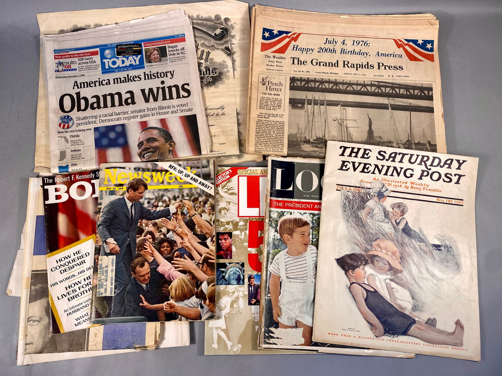Historical Newspapers, Magazines, and Ephemera Presidential &Commemorative Materials: This lot comprises a variety of historical printed materials spanning from 1911 to 2008, with a significant emphasis on American political history and the Kennedy family. The newspaper selection