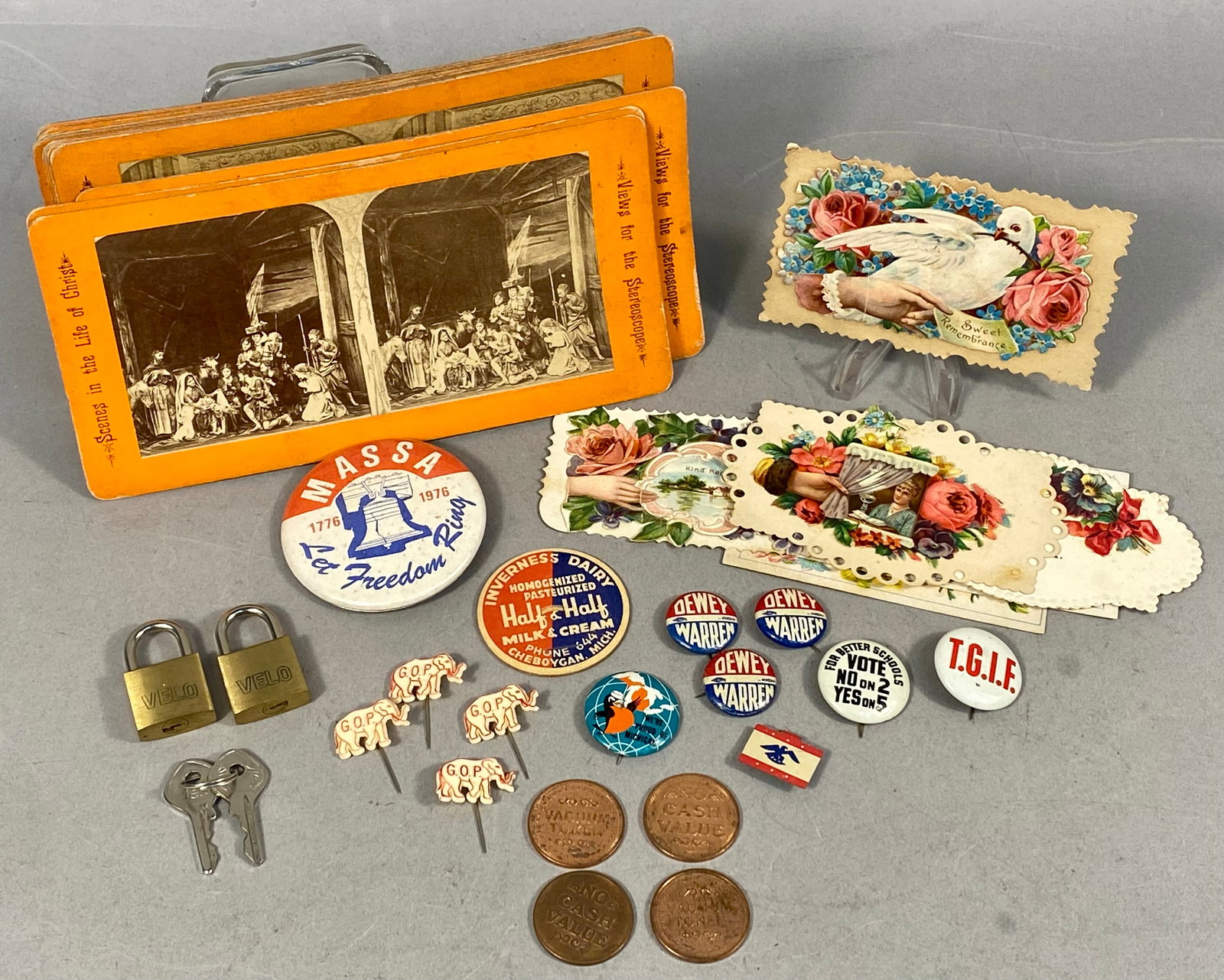 Vintage Ephemera, 12 Stereoview Cards, Political Pins & Small Collectibles: This lot features a diverse collection of antique and vintage ephemera, political memorabilia, and small hardware. Included are 12 stereoview cards from the Scenes in the Life of Christ series,