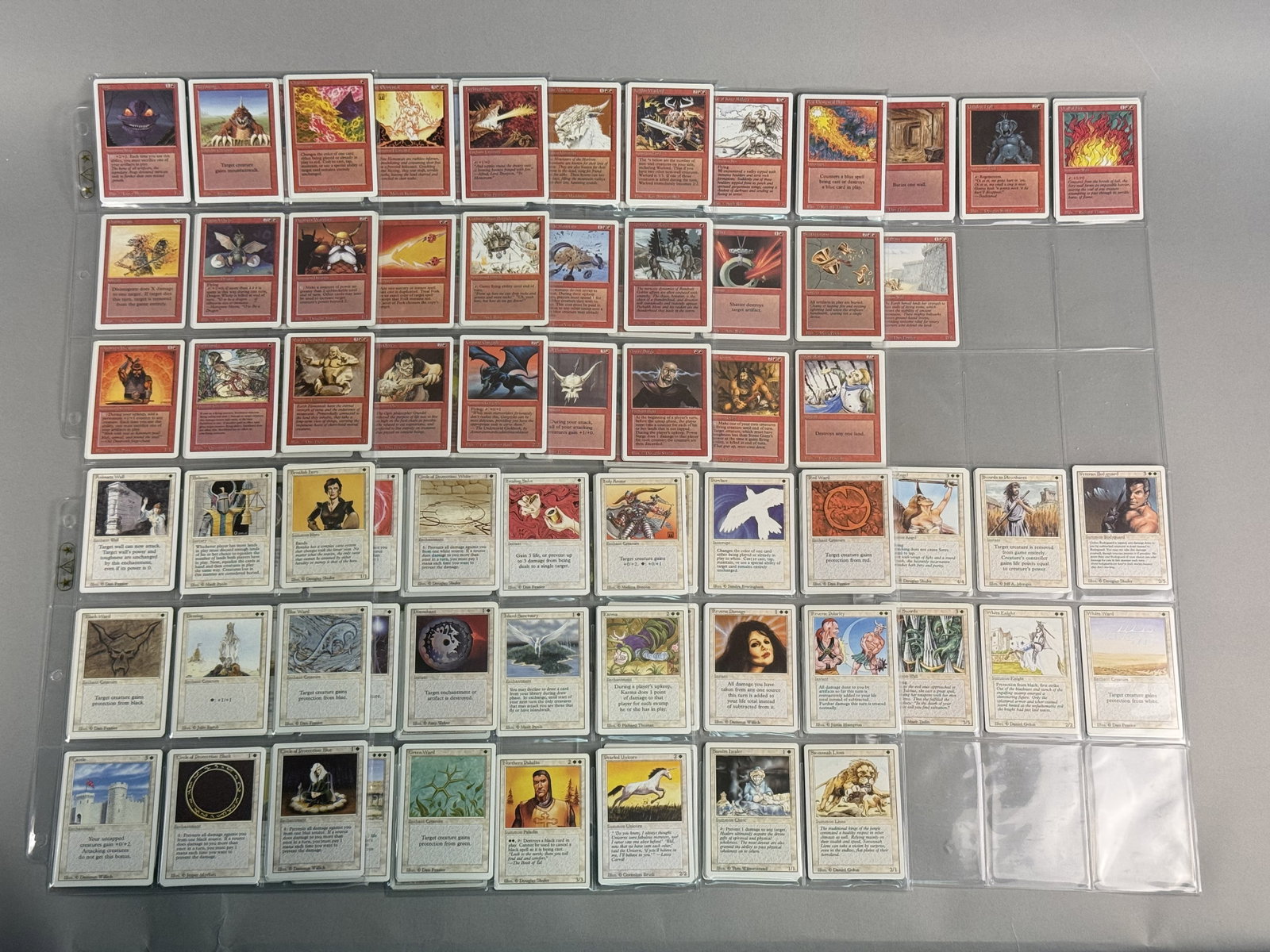 Magic: The Gathering Revised Red and White Cards: A collection of Magic: The Gathering trading cards from the Revised Edition. Lot consists of Red and White Cards. There are multiples (up to 4) of some cards. Individual card dimensions: 2.5 x 3.5