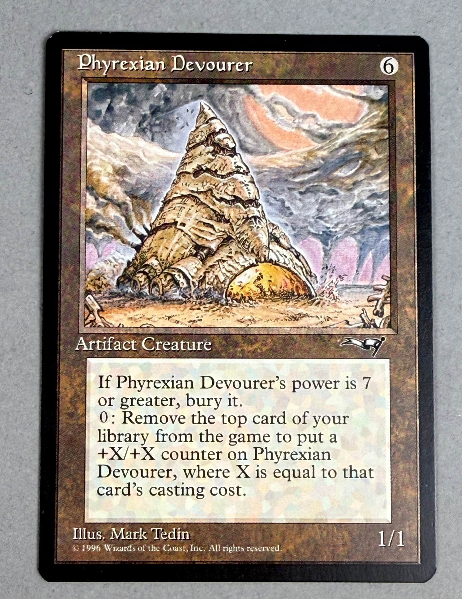 Magic The Gathering Phyrexian Devourer Alliances: One single Magic: The Gathering trading card titled Phyrexian Devourer from the Alliances expansion set, released in 1996. The copyright line at the bottom reads: 1996 Wizards of the Coast, Inc. All r