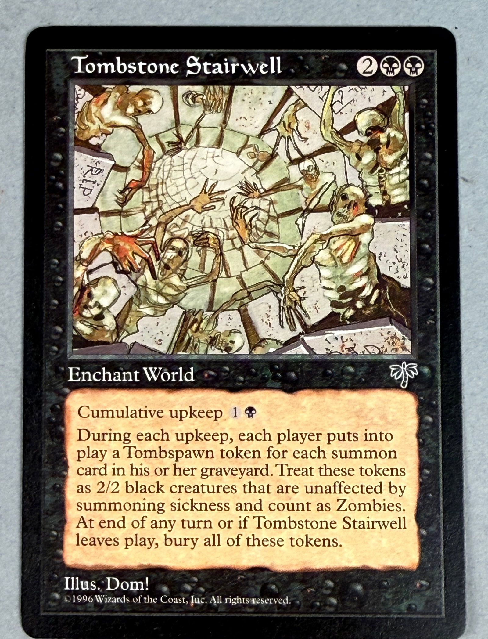 Magic: The Gathering Tombstone Stairwell Mirage: This is an original Magic: The Gathering (MTG) trading card titled Tombstone Stairwell from the Mirage expansion set, released in 1996. The copyright information at the bottom reads: Â©1996 Wizards 