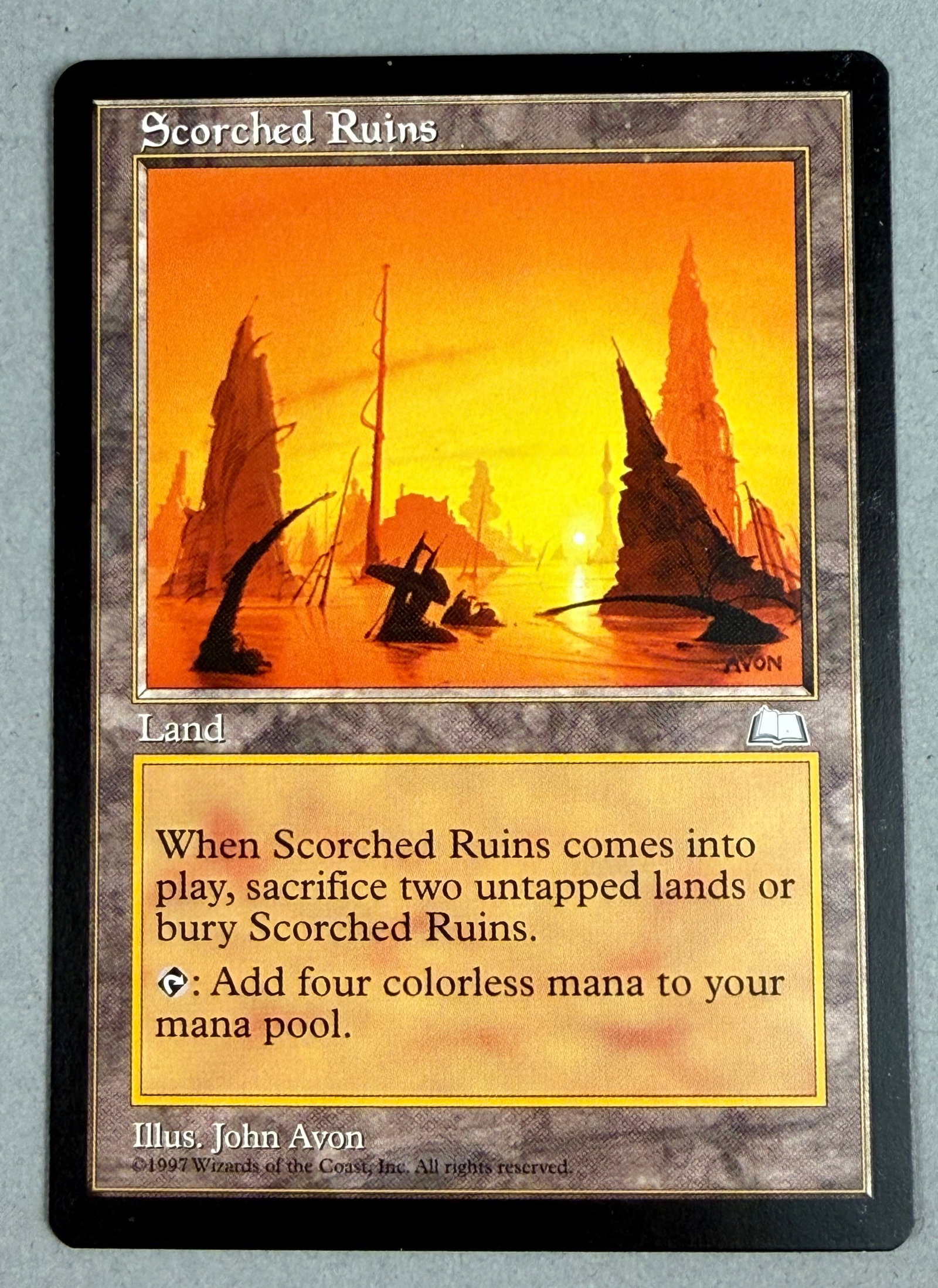 Magic The Gathering Scorched Ruins Weatherlight: This is a Wizards of the Coast Magic: The Gathering trading card identified as Scorched Ruins from the Weatherlight expansion set. The reverse side shows the standard Magic The Gathering card back wit