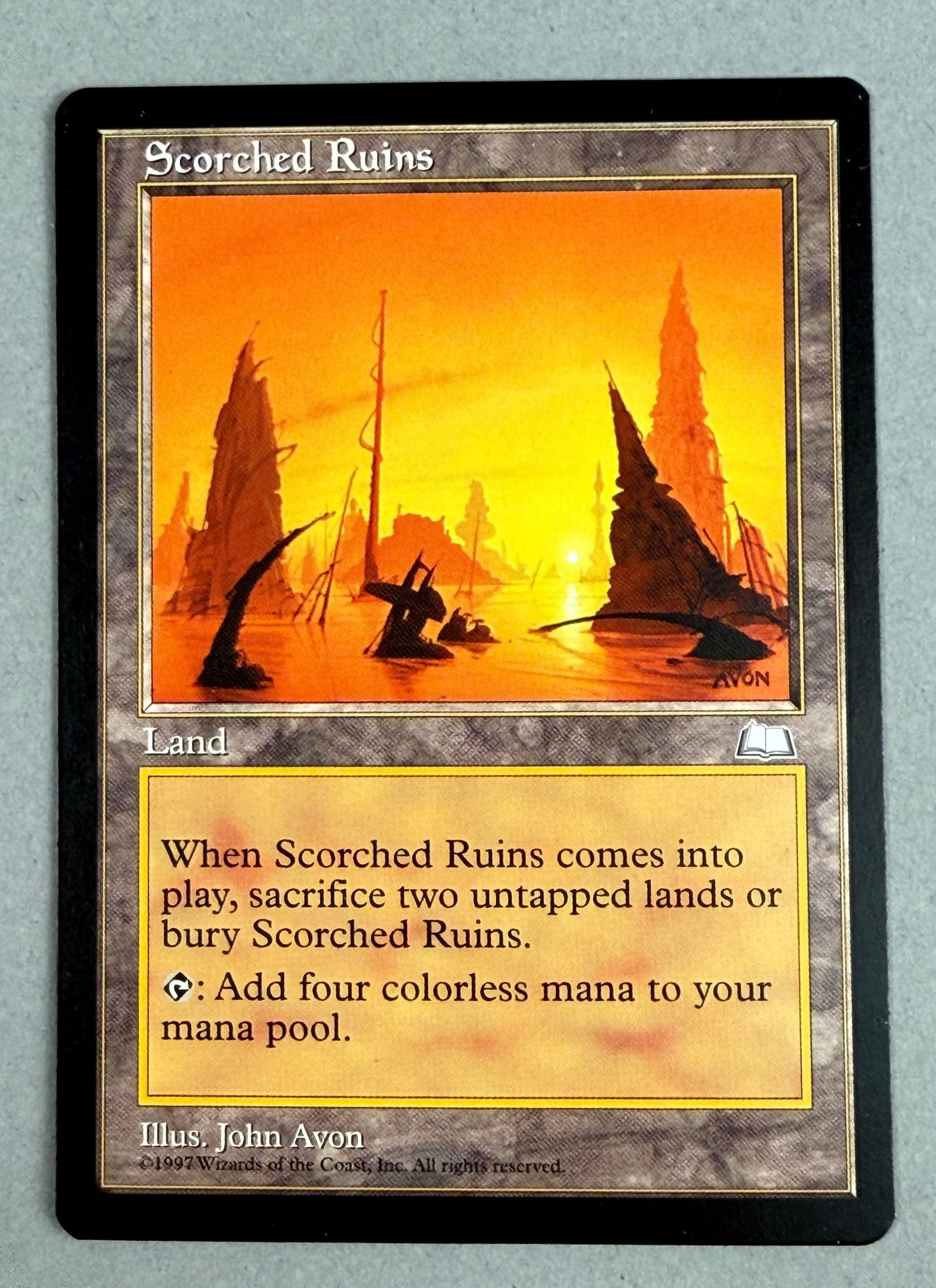 Magic The Gathering Scorched Ruins Weatherlight: This is an original trading card for Magic: The Gathering titled Scorched Ruins from the Weatherlight expansion set, released in June 1997. TThe bottom margin includes the artist attribution and copyr