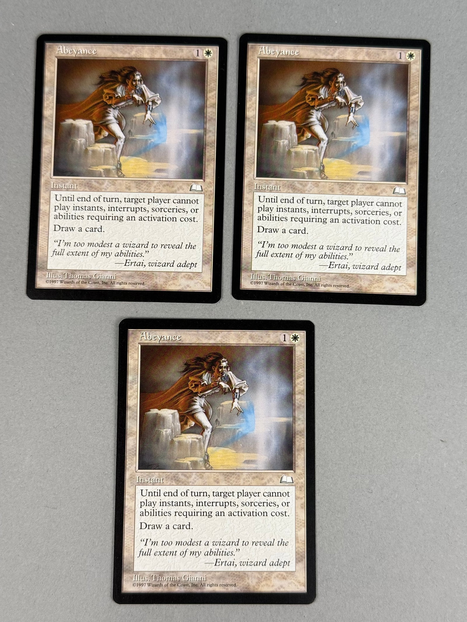 3 Magic The Gathering Abeyance Weatherlight: This lot consists of three Magic The Gathering trading cards titled Abeyance from the 1997 Weatherlight expansion. Each card measures approximately 2.5 inches by 3.5 inches These ungraded cards are