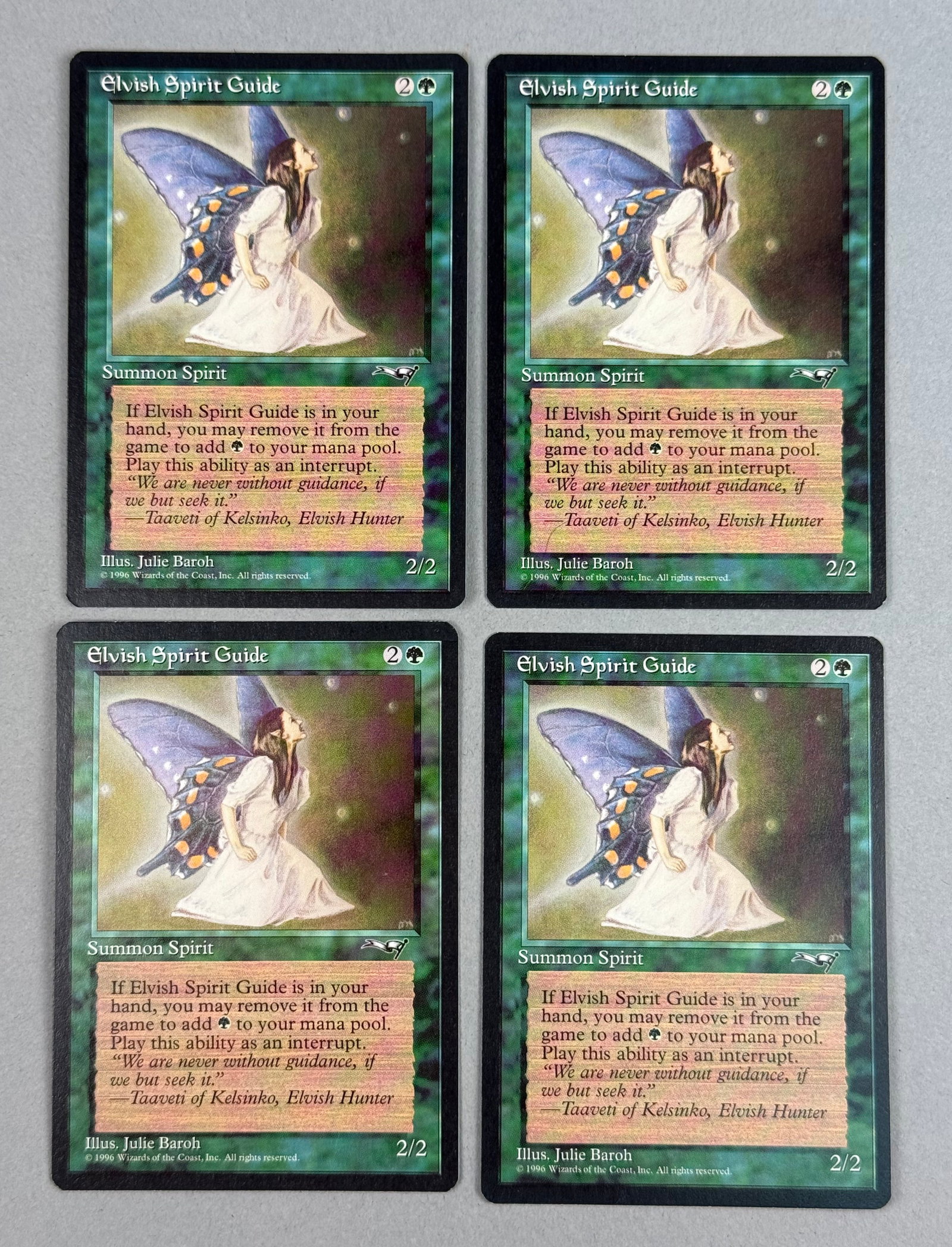 4 Magic: The Gathering Elvish Spirit Guide Alliances: A set of four original Magic: The Gathering trading cards featuring the card Elvish Spirit Guide from the Alliances expansion set, released in 1996. The copyright information at the bottom of each
