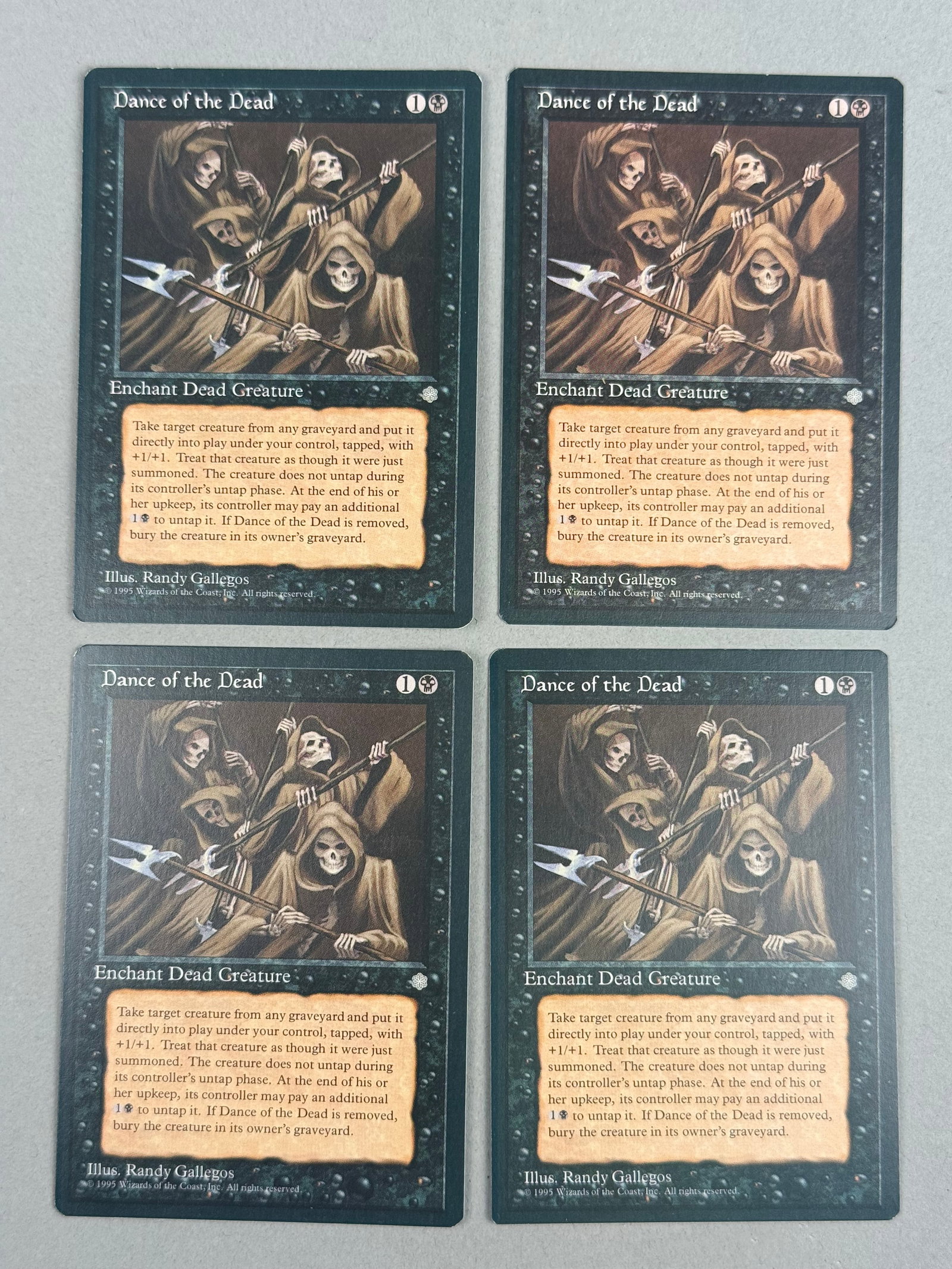 4 Magic The Gathering Dance of the Dead Ice Age: This is a set of four original Magic The Gathering (MTG) trading cards titled Dance of the Dead. The bottom right of the card faces contain the copyright line reading 1995 Wizards of the Coast, Inc. A
