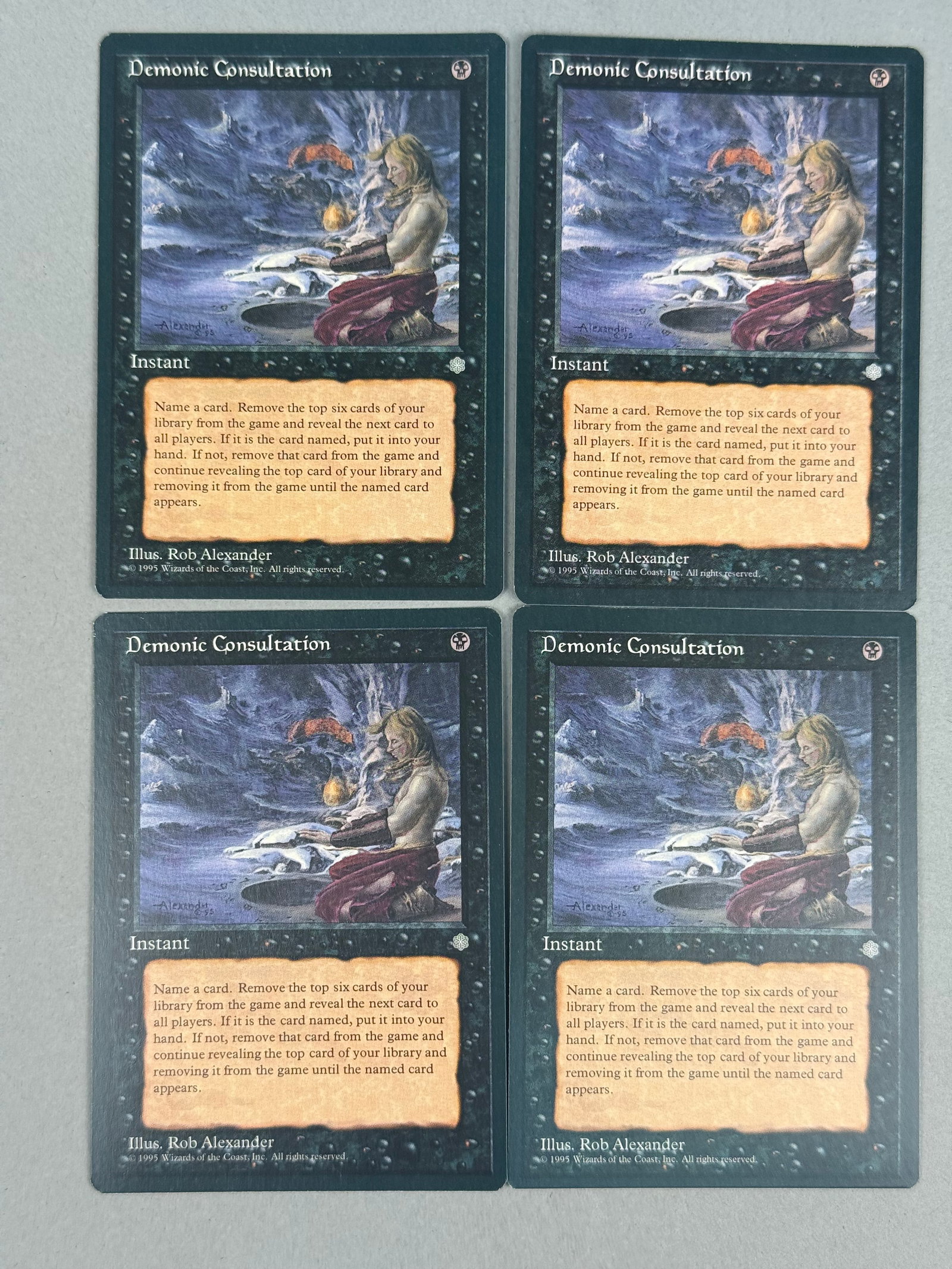 4 Magic The Gathering Demonic Consultation Ice Age: A lot of four Demonic Consultation A copyright line at the bottom reads: 1995 Wizards of the Coast, Inc. All rights reserved. The reverse of each card features the traditional Magic The Gathering