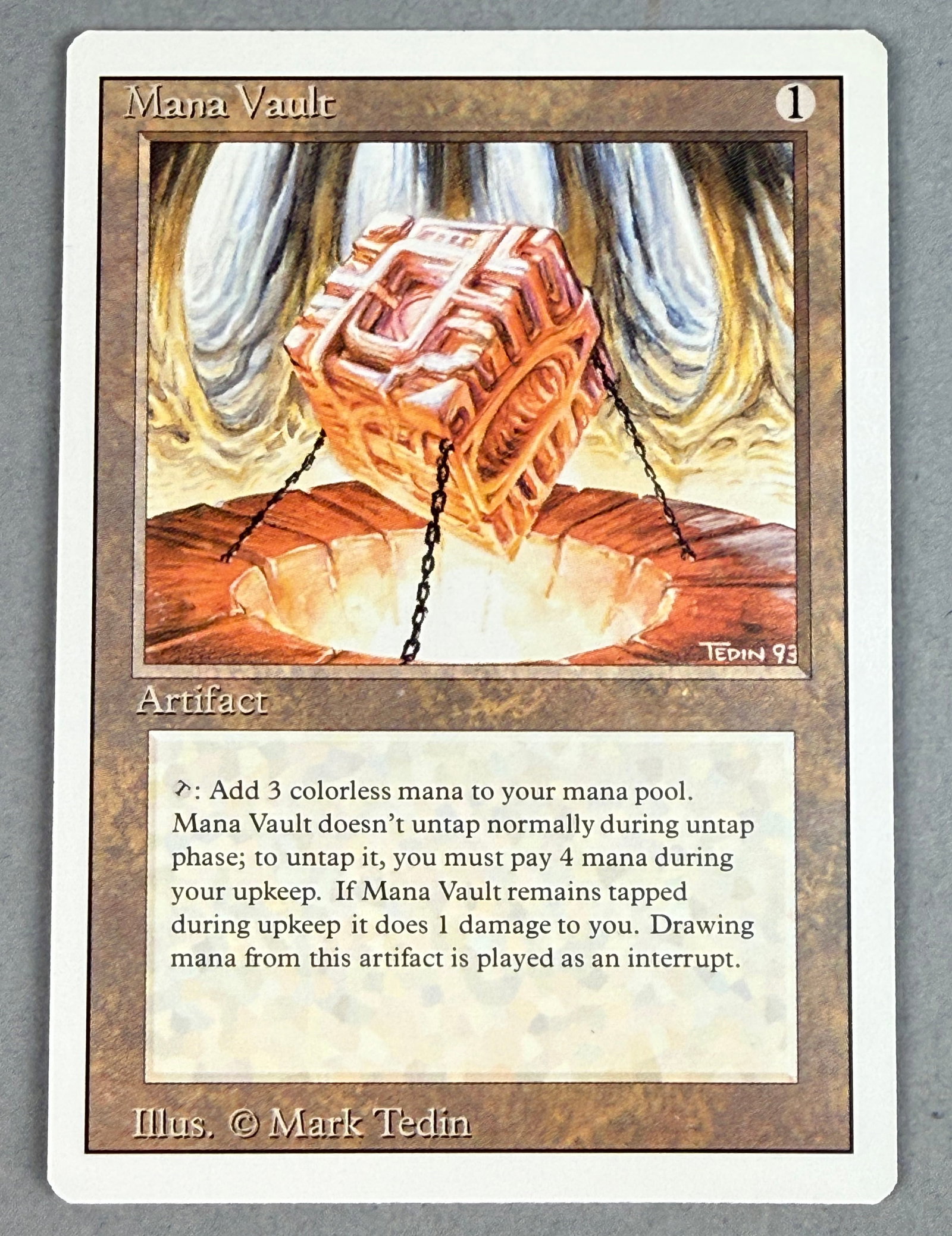 Magic The Gathering Mana Vault Revised: This is a single Magic: The Gathering trading card, Mana Vault, from the Revised Edition set released in 1993. The back of the card features the standard five-color pentagon design and the Magic: The 