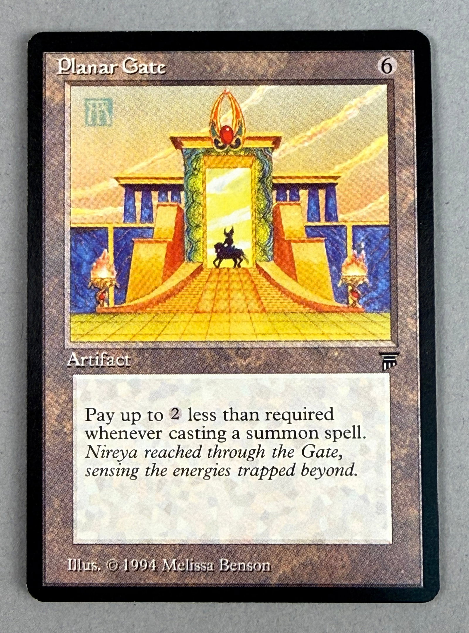 Magic The Gathering Planar Gate Legends: This is a single collectible trading card from the Magic The Gathering franchise titled Planar Gate. It is a Rare Artifact card from the Legends expansion set, originally released in 1994. The card is