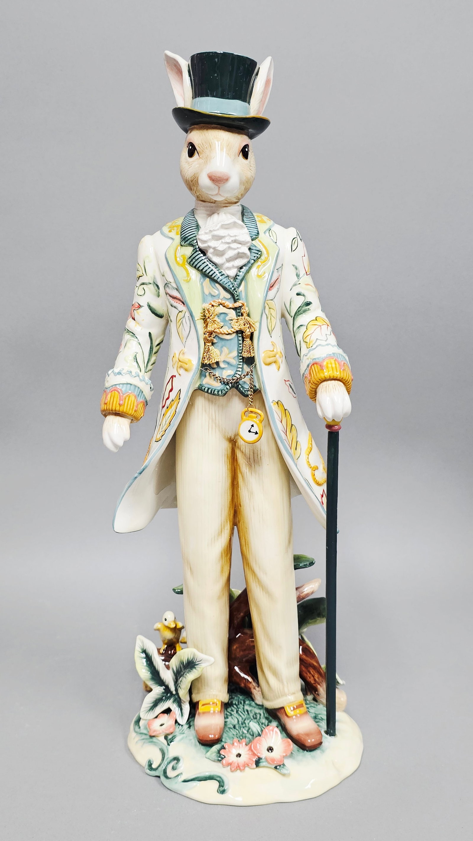 Fitz and Floyd Classics Dapper Rabbits Male Figurine: A large hand-painted ceramic figurine from the Fitz and Floyd Dapper Rabbits collection. This piece depicts an anthropomorphic male rabbit dressed in elaborate Regency-style attire. The underside of t
