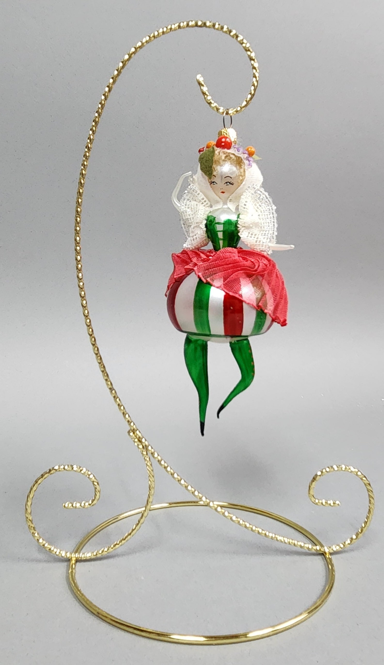 Blown Glass Ballerina Christmas Ornament: Stand not included. A vintage blown glass Christmas ornament in the form of a stylized female figure, possibly a ballerina or sugarplum fairy. Length: Approximately 5.5 inches. Good vintage condition 