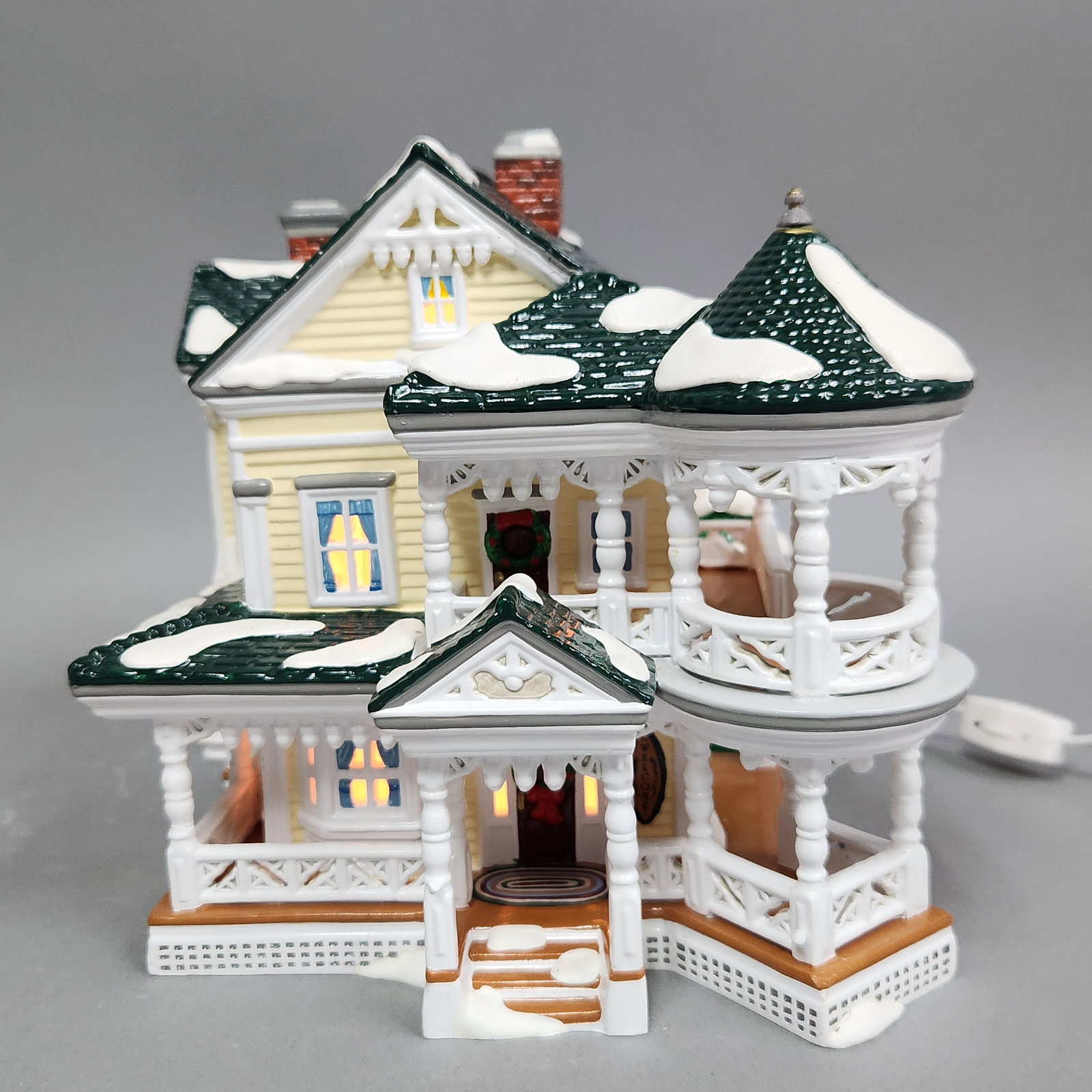 Dept 56 Carpenter Gothic B &B: Department 56 Carpenter Gothic Bed & Breakfast #55043. An integrated power cord is attached. Approximate height: 7.75 inches. The item is in good overall condition with no visible chips, cracks, or