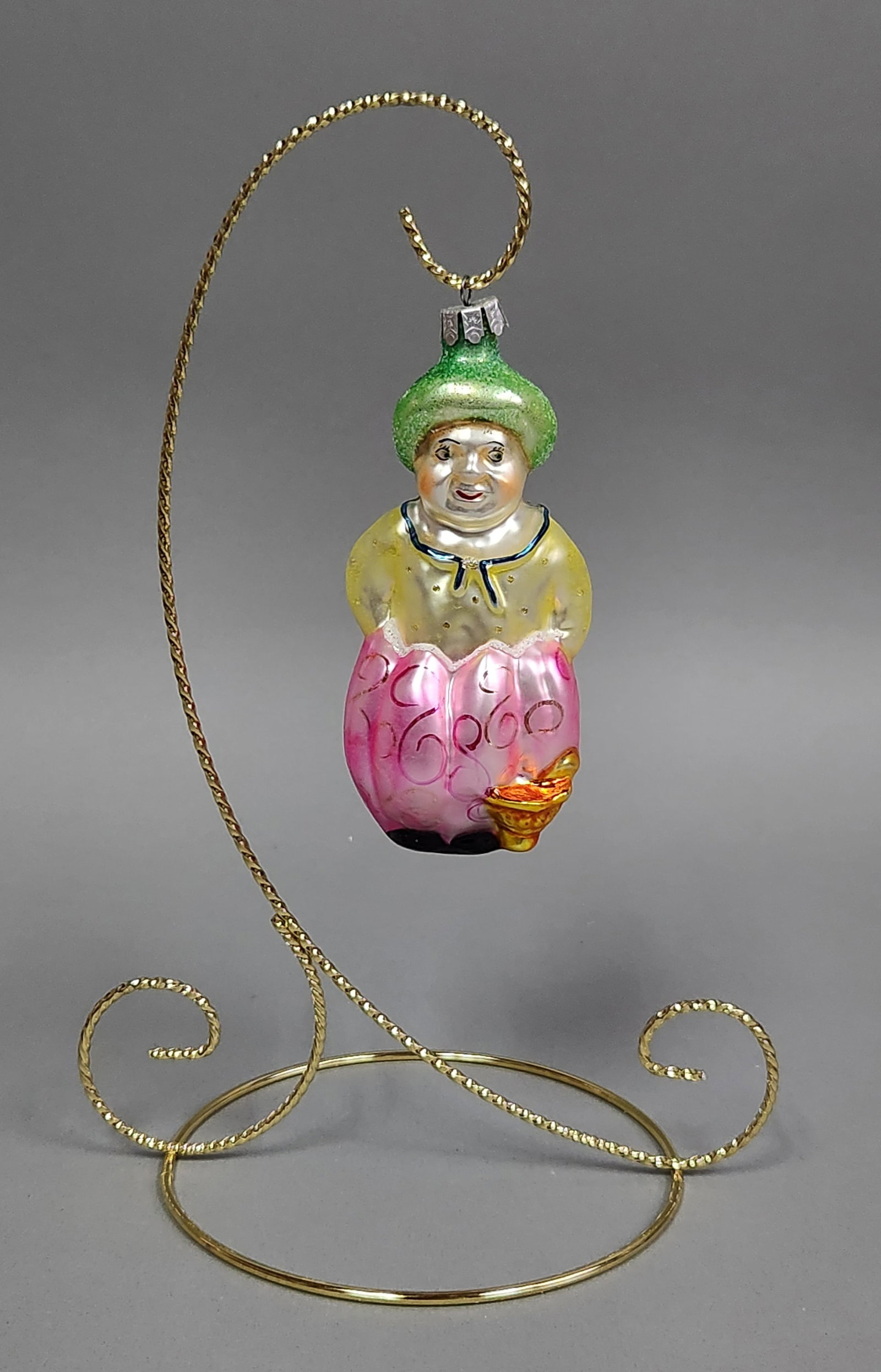 Christopher Radko Aladdin Ornament: Stand not included. A Christopher Radko Aladdin blown glass Christmas ornament measuring approximately 4 inches in length. Very good condition.