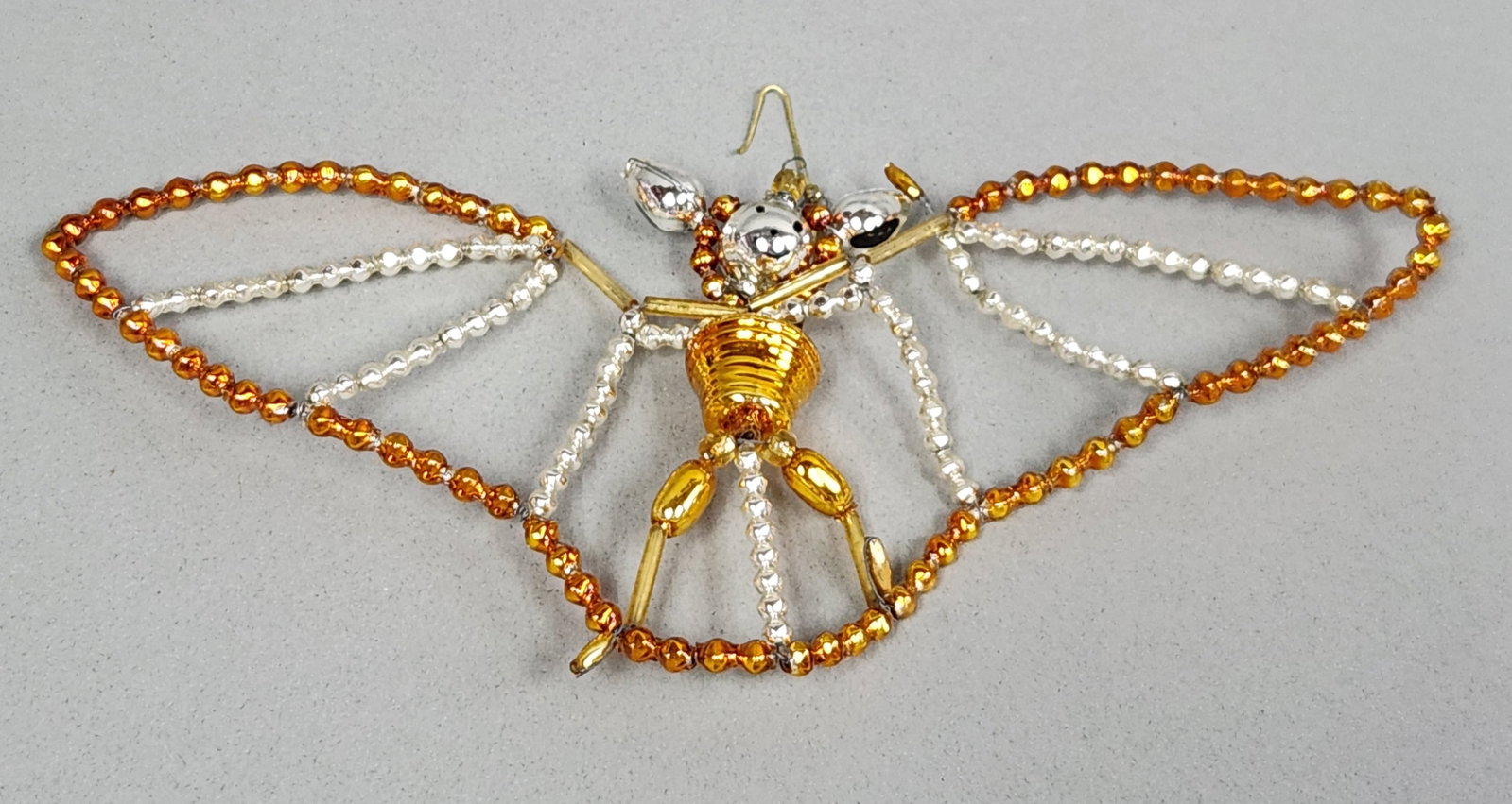 Radko Beaded Butterfly Ornament: Christopher Radko butterfly ornament, measuring approximately 6.5 inches wide. Very good condition