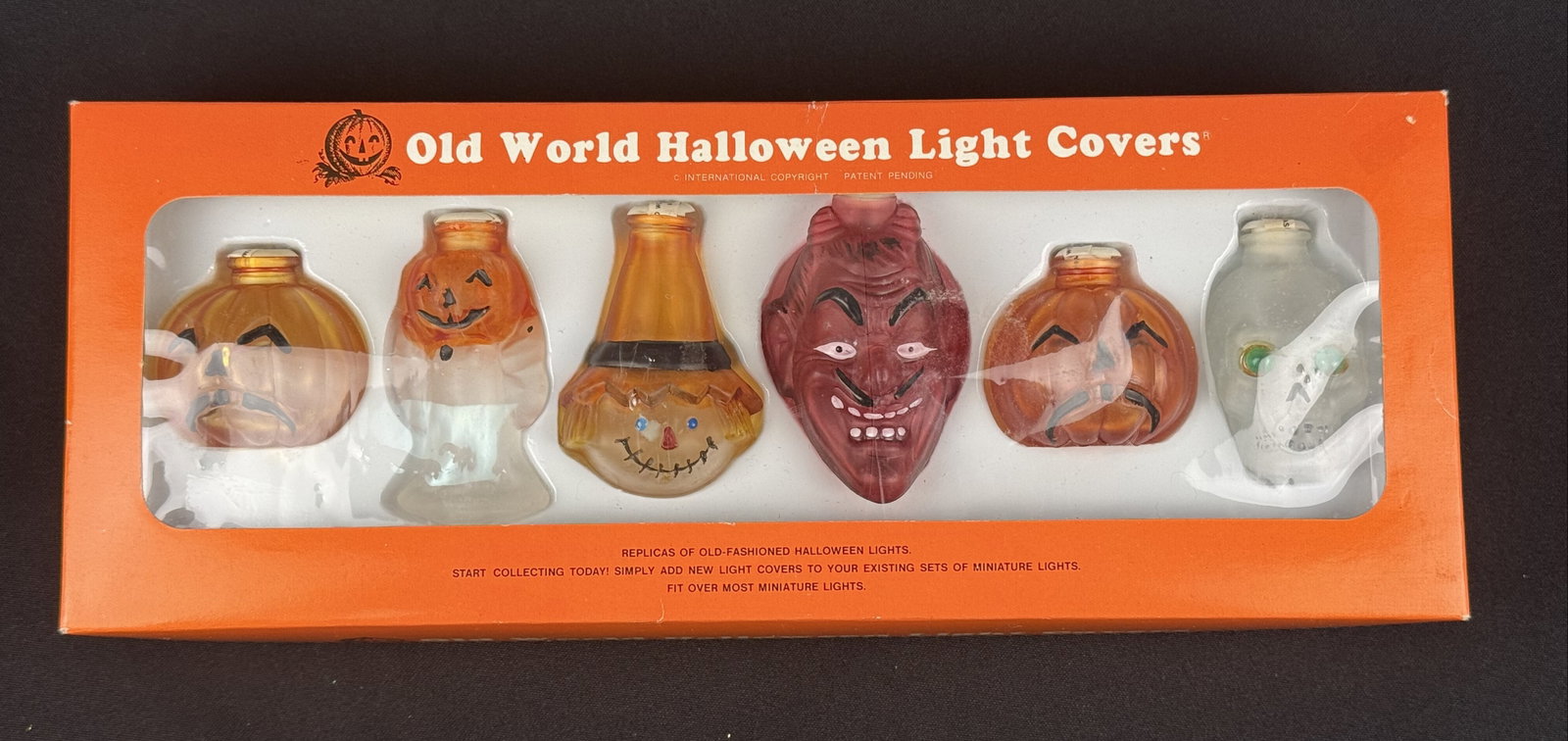 Old World Christmas Glass Halloween Light Covers: A set of Old World Halloween Light Covers produced by Old World Christmas of Spokane, Washington. These hand-produced glass covers are marketed as recreations of turn-of-the-century holiday lights,