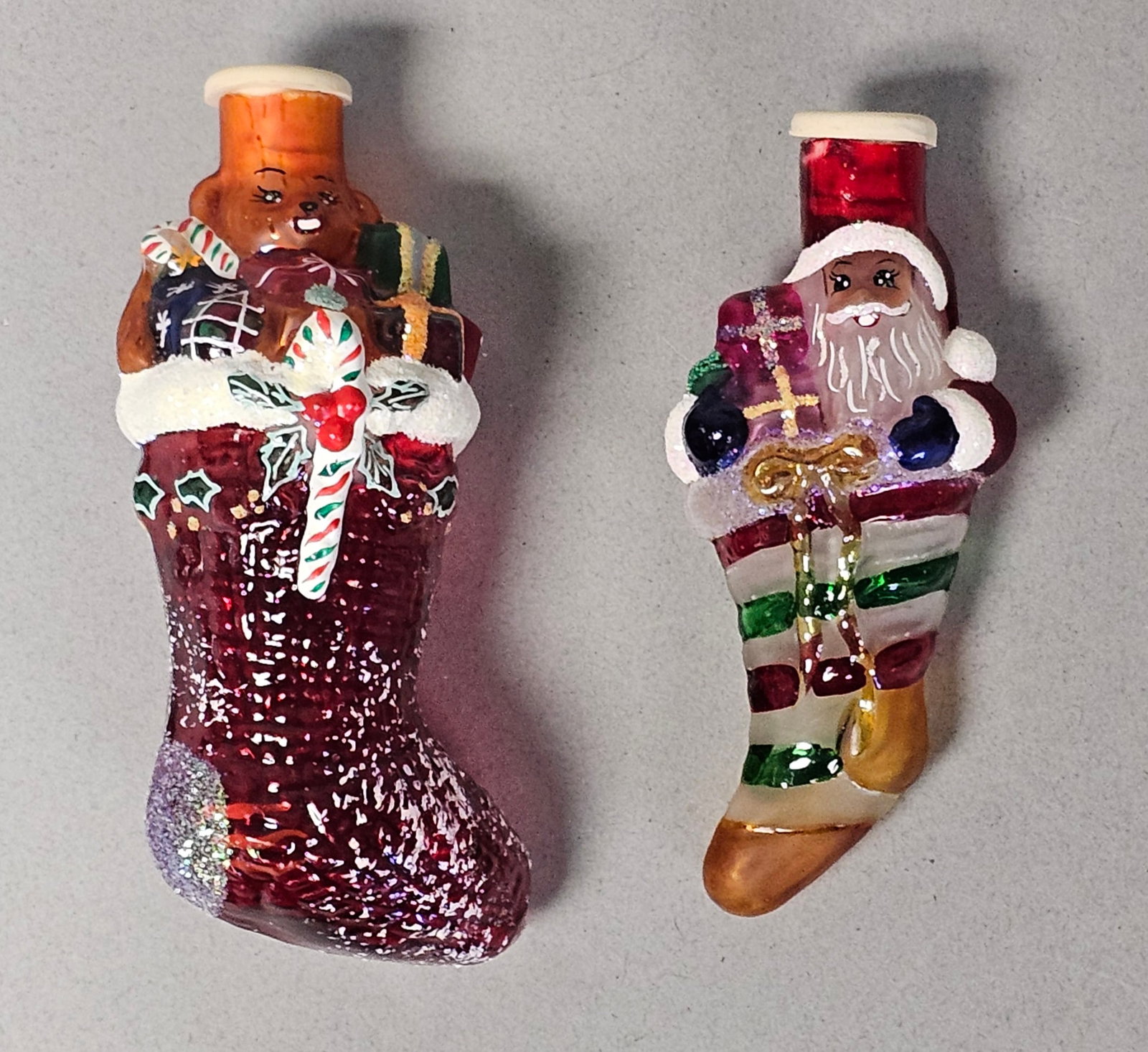 Radko Hand-Blown Glass Christmas Light Covers: These two molded glass Christmas light covers are attributed to Christopher Radko as part of the Little Gems series, appearing to be in the Stuffings Full pattern. Height: 3.75 inches and 3.5 inches. 