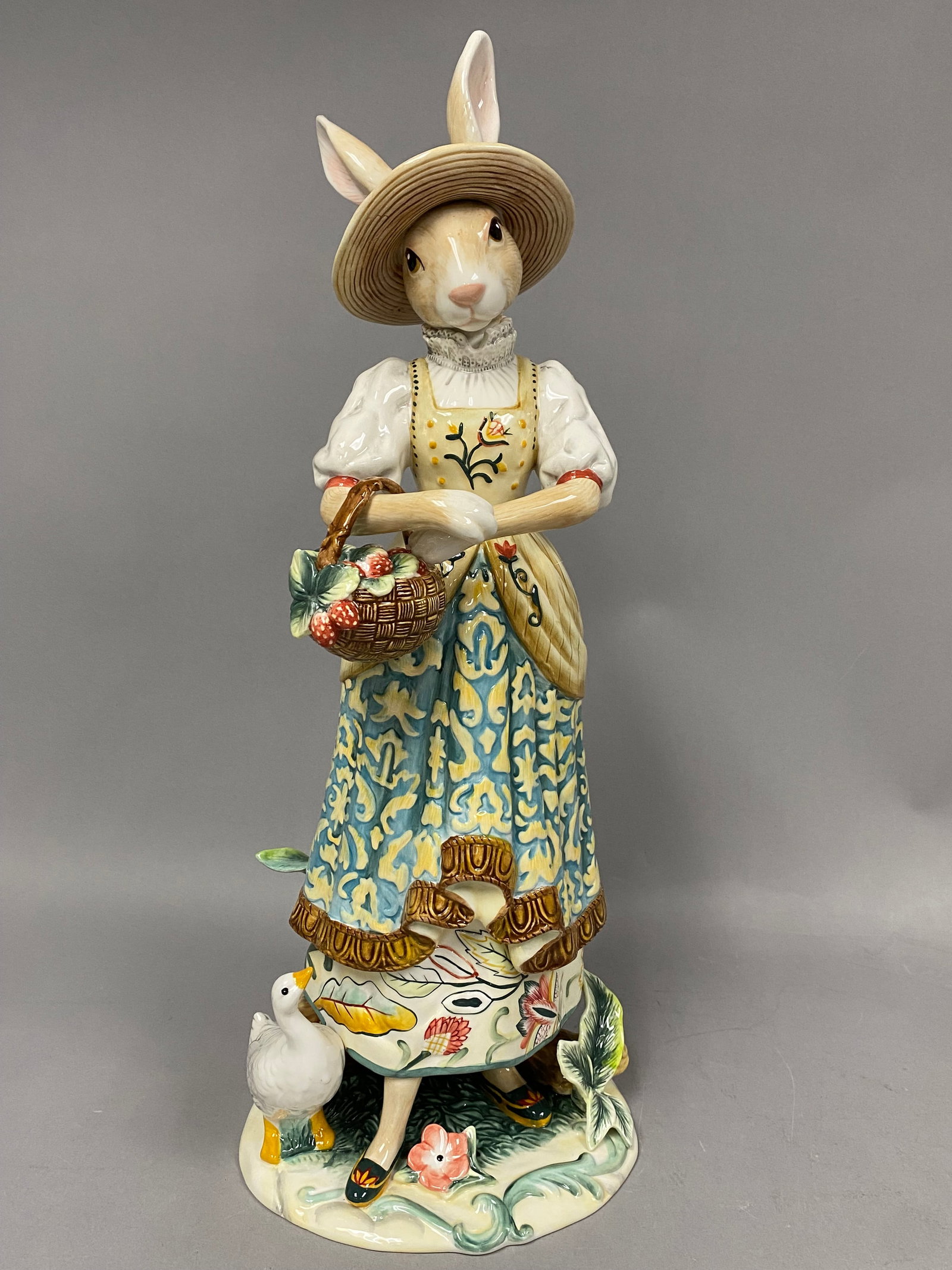 Fitz and Floyd Dapper Rabbits Large Female Figurine: Large hand-painted glazed china figurine from the Fitz and Floyd Classics Dapper Rabbits collection titled Female Figurine. The piece depicts an anthropomorphic female rabbit in elaborate folk-style a