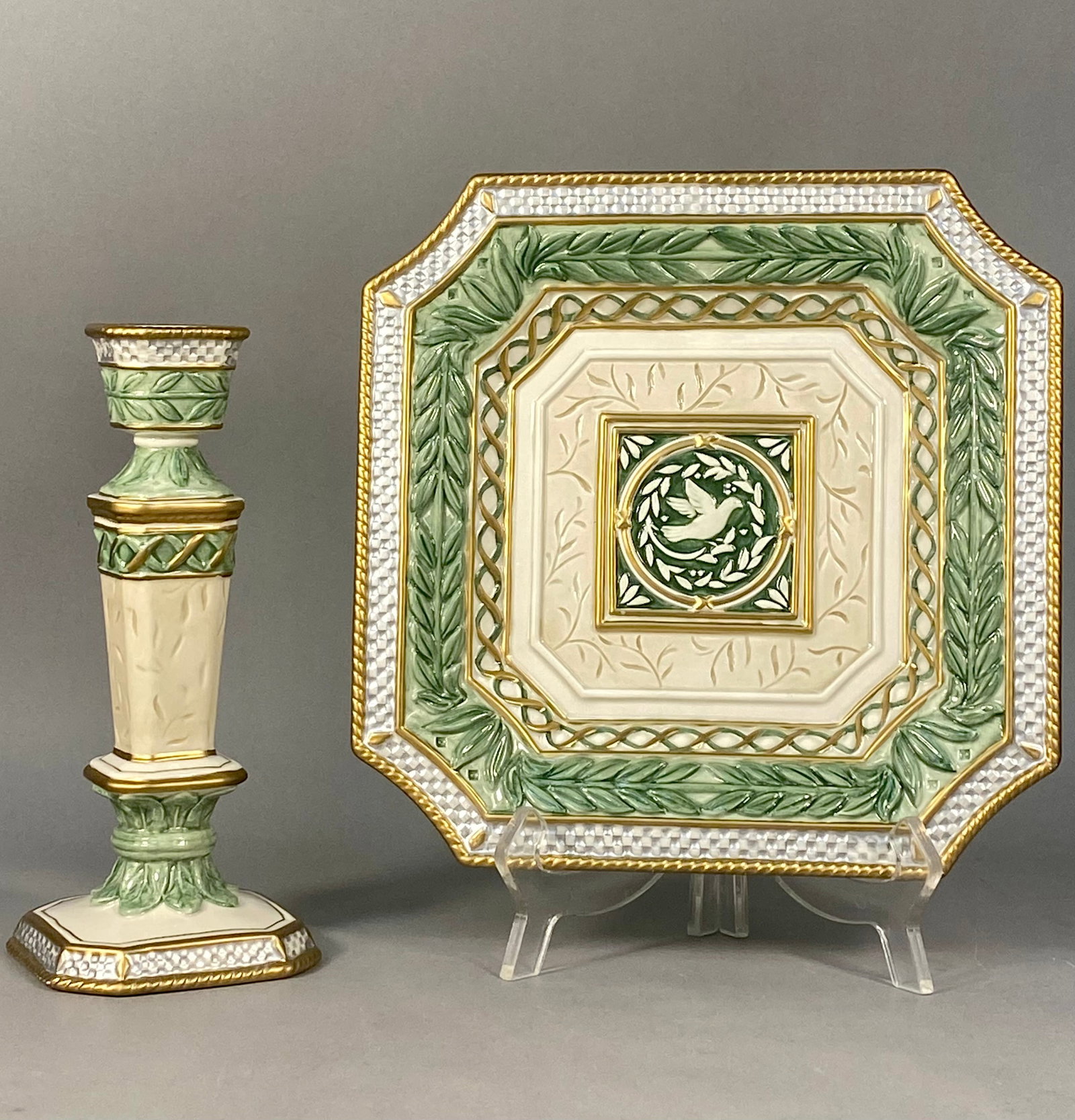 Two Fitz and Floyd Gregorian Collection Ceramic Decorative Items: This lot consists of two ceramic items from the Fitz and Floyd Gregorian Collection within the company's Classics line. The items include one baluster-form candlestick with a square base and one