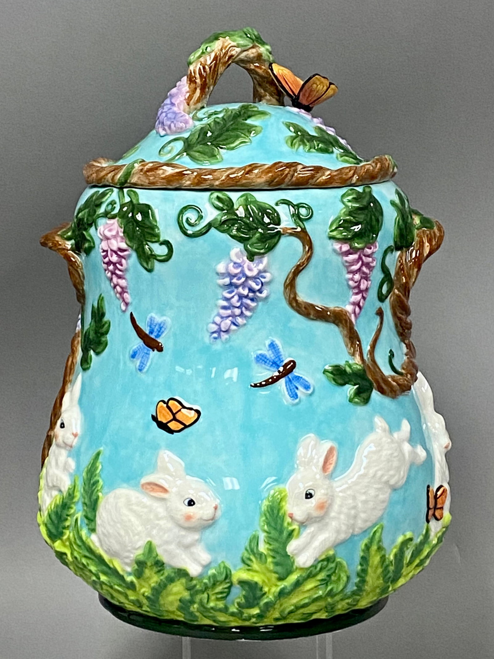 Christopher Radko Fern Meadow Cookie Jar: This is a lidded ceramic cookie jar produced by Christopher Radko as part of the Home for the Holidays collection. The jar features the Fern Meadow pattern, identified on the original packaging as the