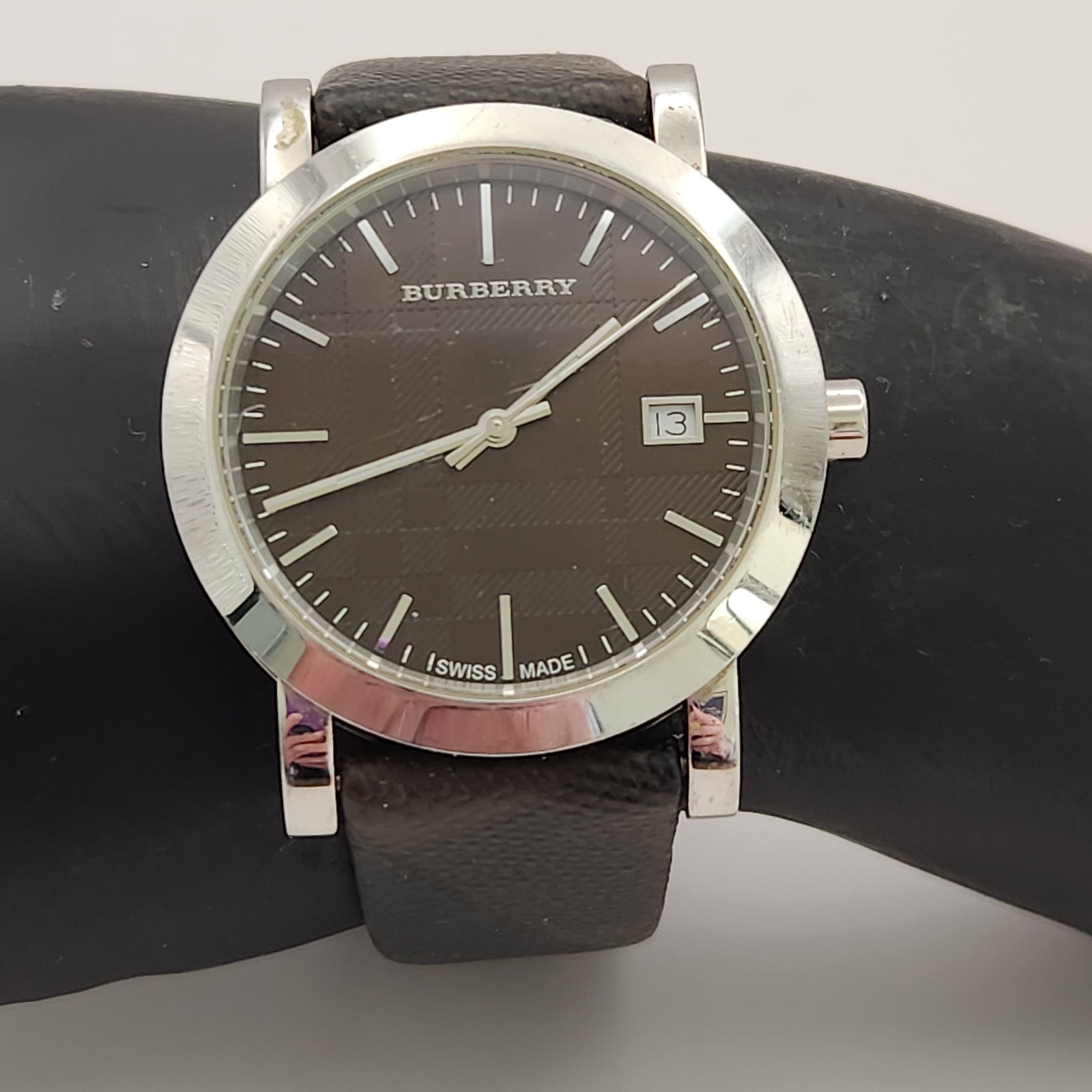 Burberry BU1775 Quartz Watch: A Burberry Swiss Made quartz wristwatch, reference number BU1775. The case back is engraved with the Burberry logo, ESTABLISHED 1856, model number BU1775, serial number 13088, 50M/165FEET, and SWISS M