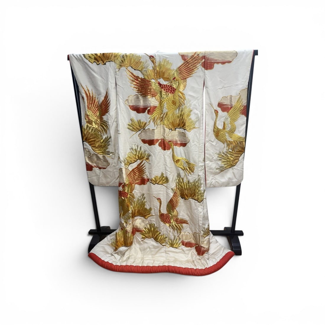 Mid Century Japanese White Silk Rinzu Uchikake Wedding Kimono: A Japanese wedding kimono, known as an uchikake, constructed from white figured silk damask (rinzu). The exterior fabric features a woven-in sayagata (geometric key-fret) pattern throughout the backgr