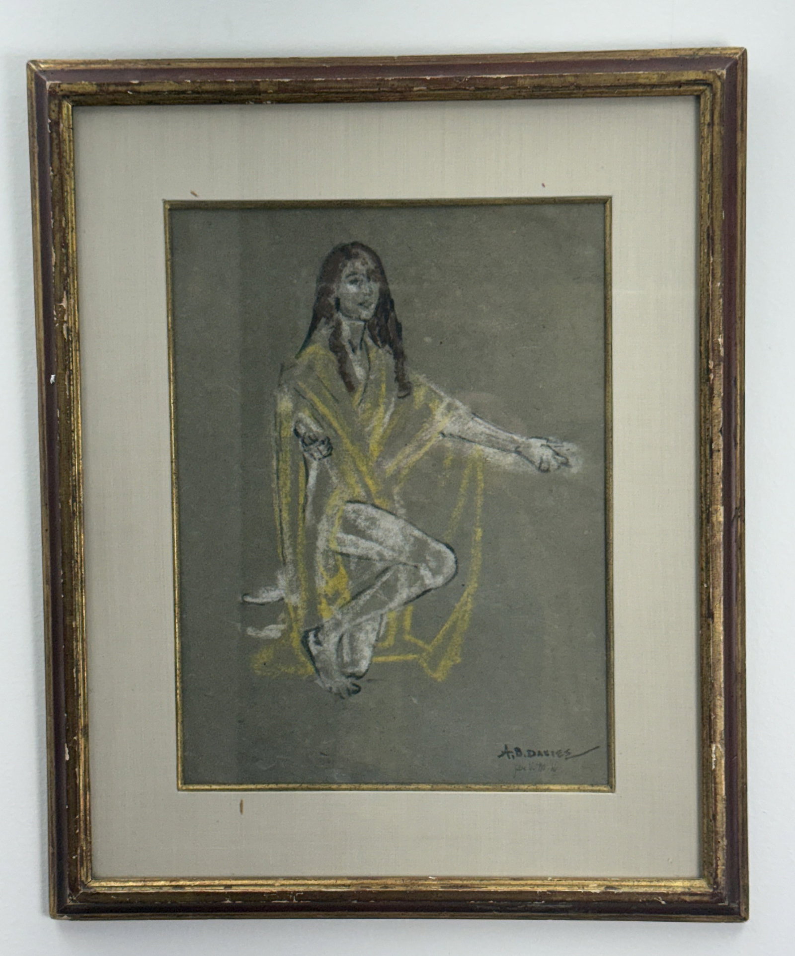 Arthur B. Davies Kneeling Figure Pastel on Paper: This original work on paper by American artist Arthur B. Davies depicts a kneeling female figure rendered in a lyrical, symbolic style. Executed in pastel and chalk on gray-toned paper, the compositio