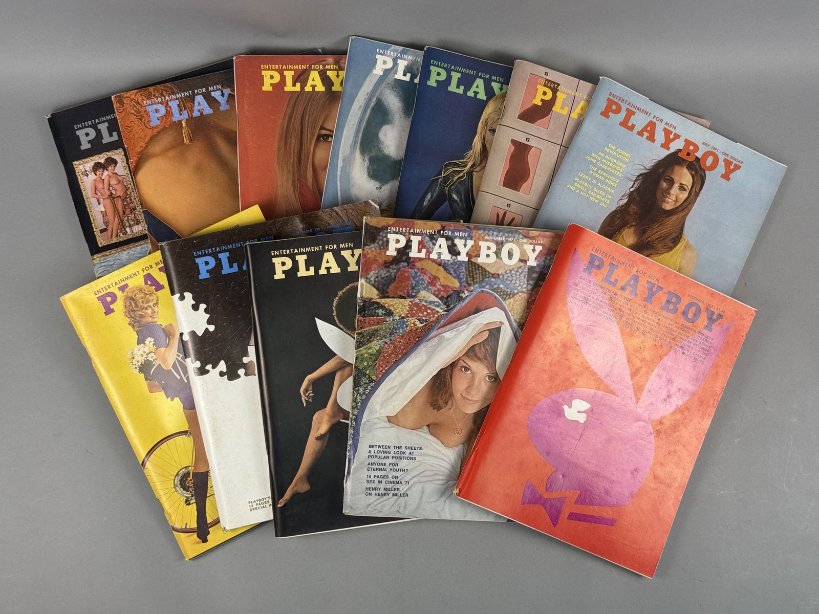 1971 Playboy Magazines Complete Year Run: This collection consists of twelve vintage Playboy magazines, comprising a complete calendar year for 1971. Height: 11 inches Width: 8.25 inches Stack Height: 5.75 inches. The collection is in overall