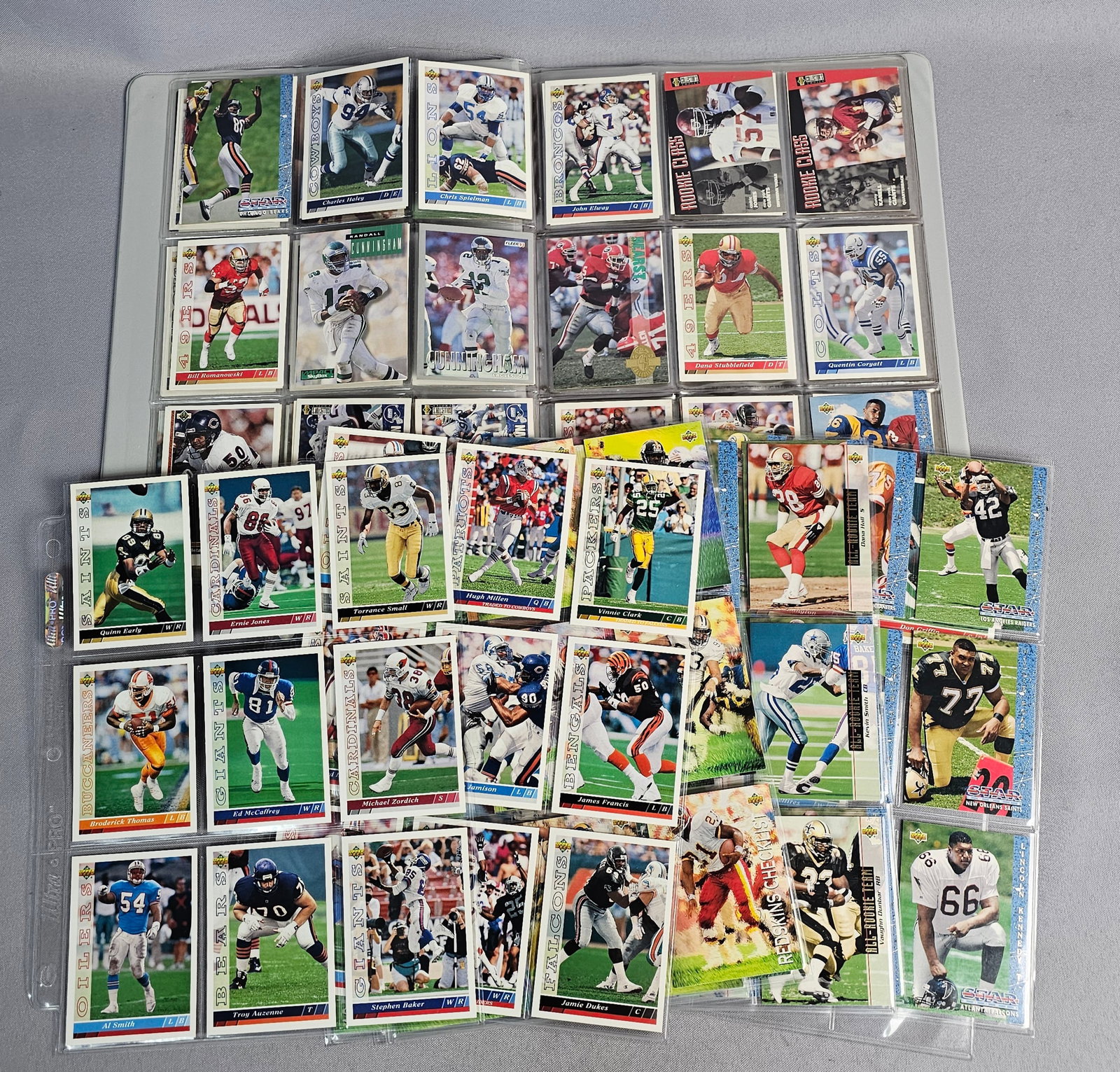 Collection of NFL Football Trading Cards: This is an extensive collection of professional American football trading cards primarily dating from 1991 to 1993. The collection features a significant number of Hall of Fame players and star athlet