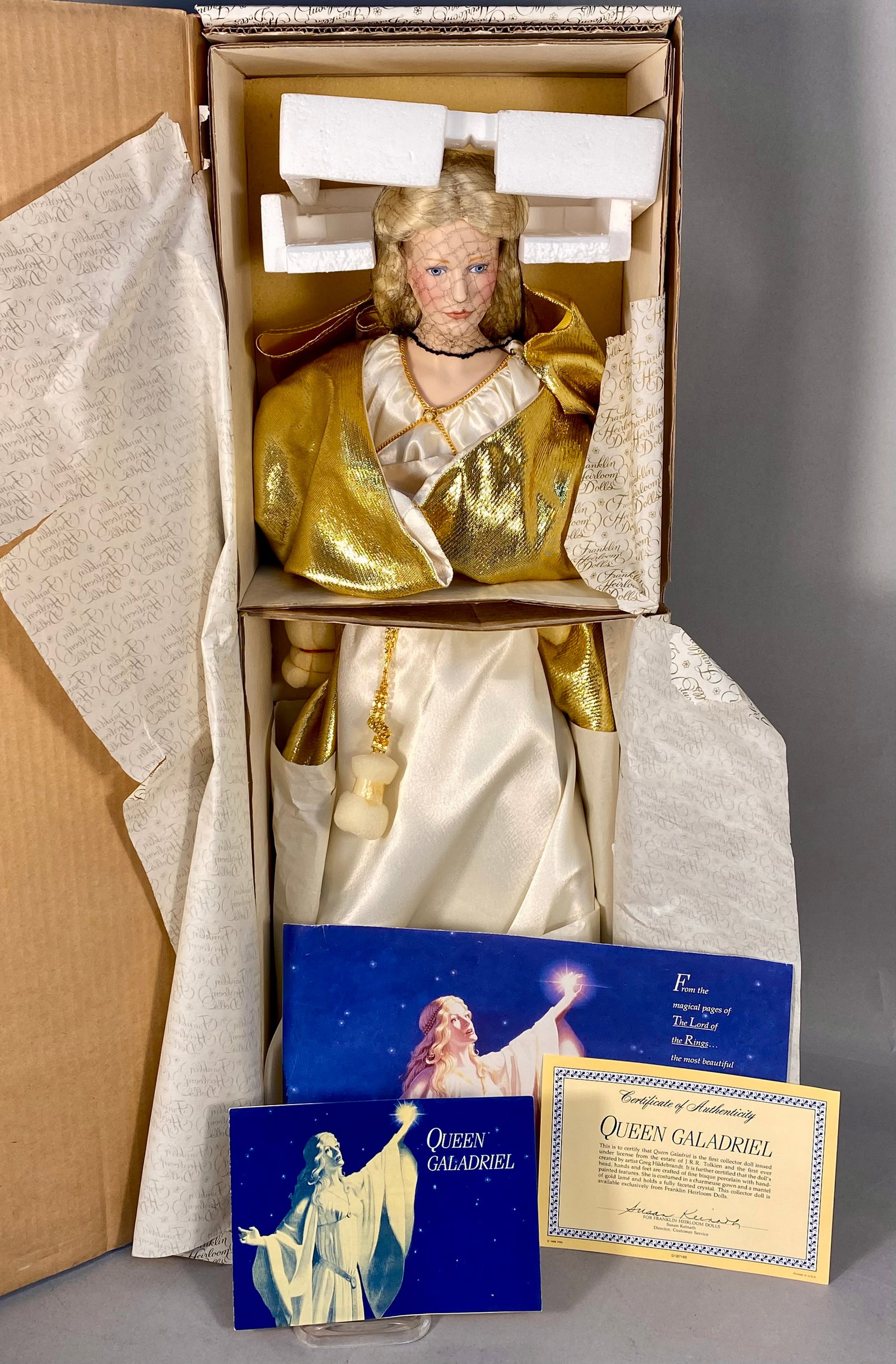Franklin Heirloom J.R.R. Tolkien's Queen Galadriel Porcelain Doll: Still in the box porcelain doll of Elven Queen Galadriel. Never been taken out and played with or displayed, excellent like new condition. All of the original papers and COA from Franklin Heirloom inc