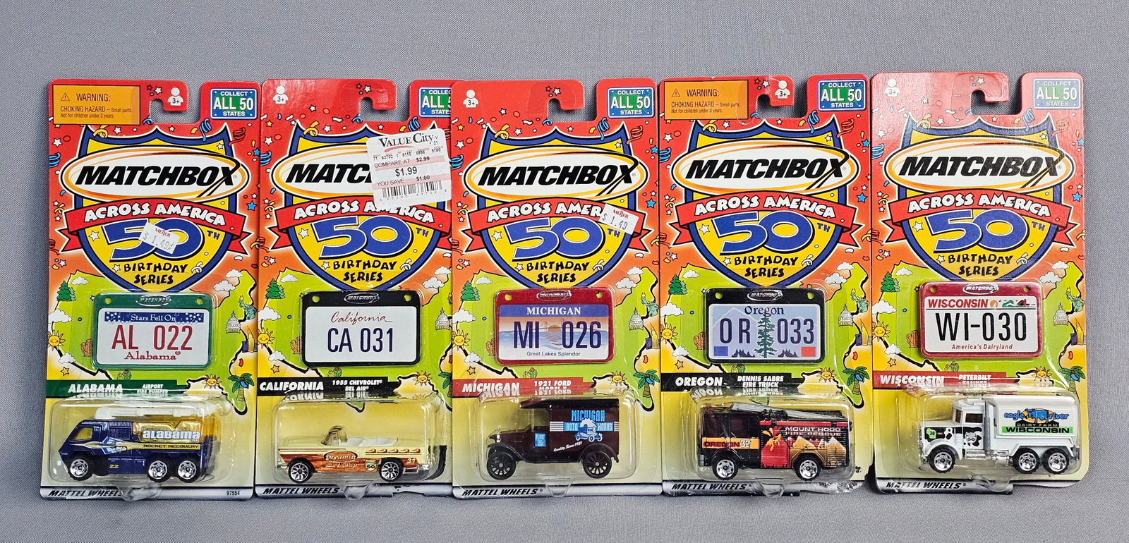 Matchbox Across America Die-Cast Vehicles: This collection consists of five die-cast vehicles from the Matchbox Across America 50th Birthday Series, produced by Mattel Wheels to commemorate the brand's 50th anniversary (1952-2002). Each vehicl