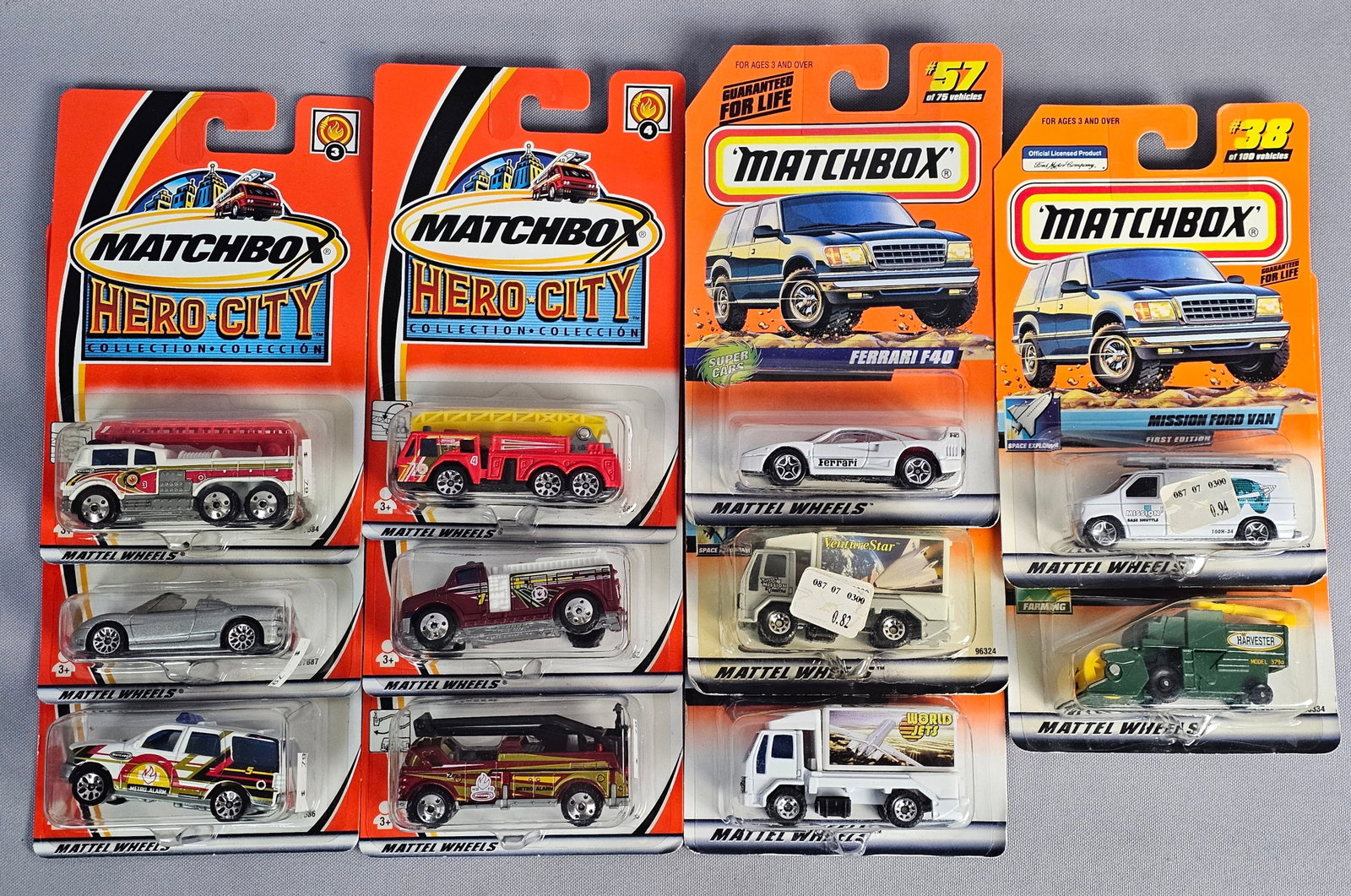 11 Matchbox Vehicles in Original Blister Packs: A collection of eleven die-cast metal toy vehicles manufactured by Matchbox under Mattel, Inc. ownership, all contained within their original factory-sealed blister pack packaging. The lot consists of
